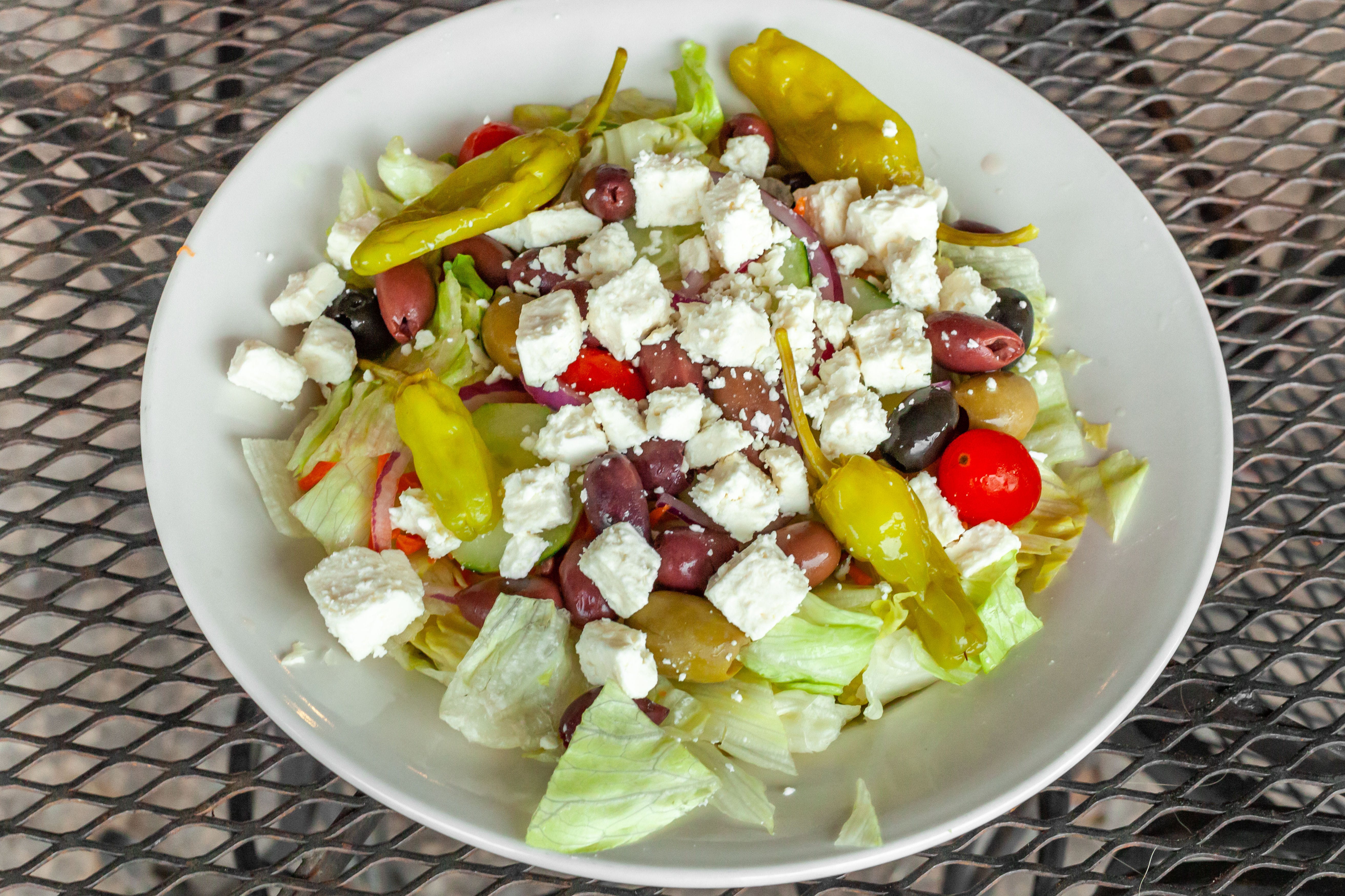 Order Greek Salad - Salad food online from Italian Delight of Powhatan store, Powhatan on bringmethat.com