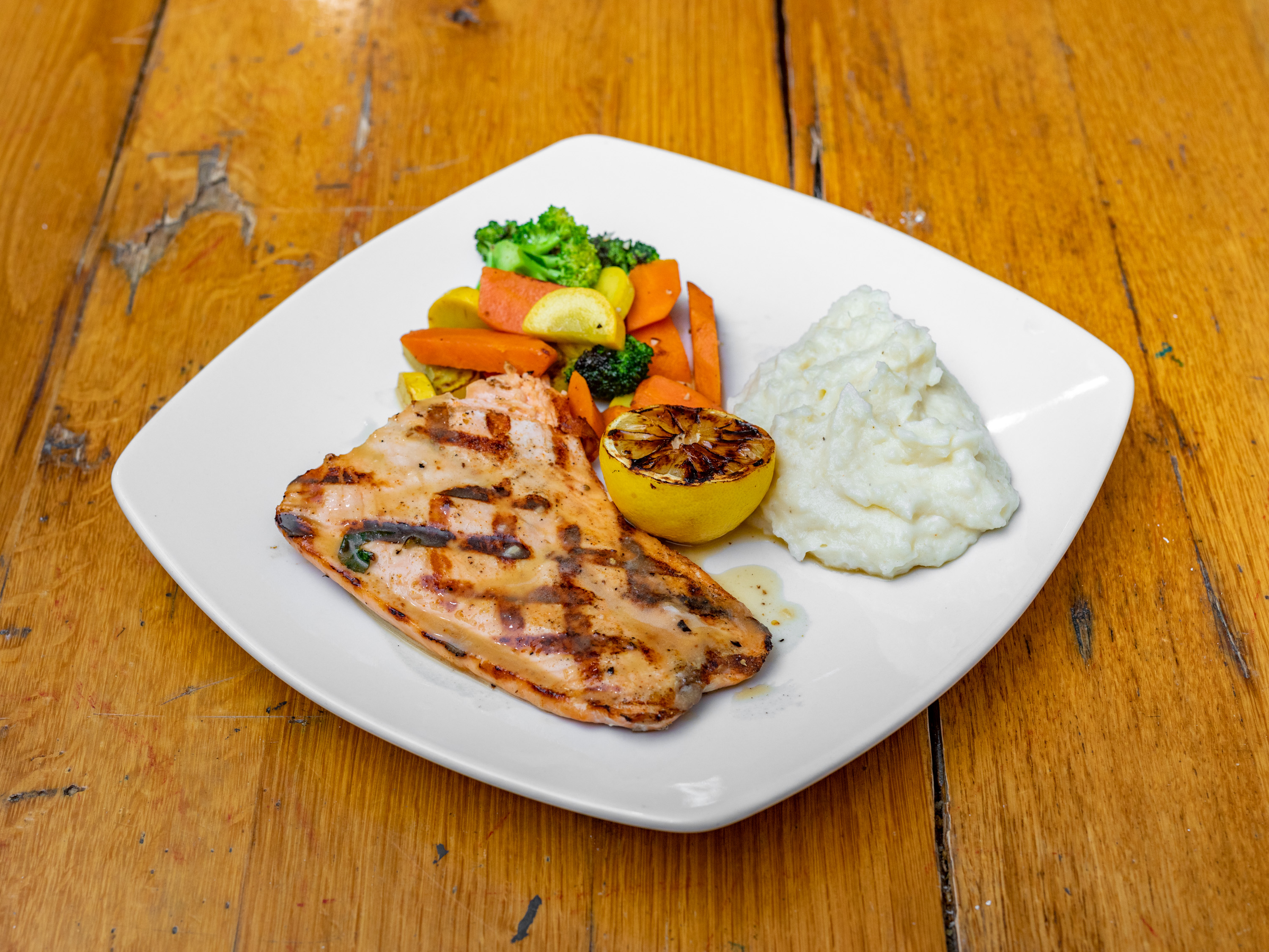 Order GRILL SALMON* food online from Thiago's Restaurant store, Chicago on bringmethat.com