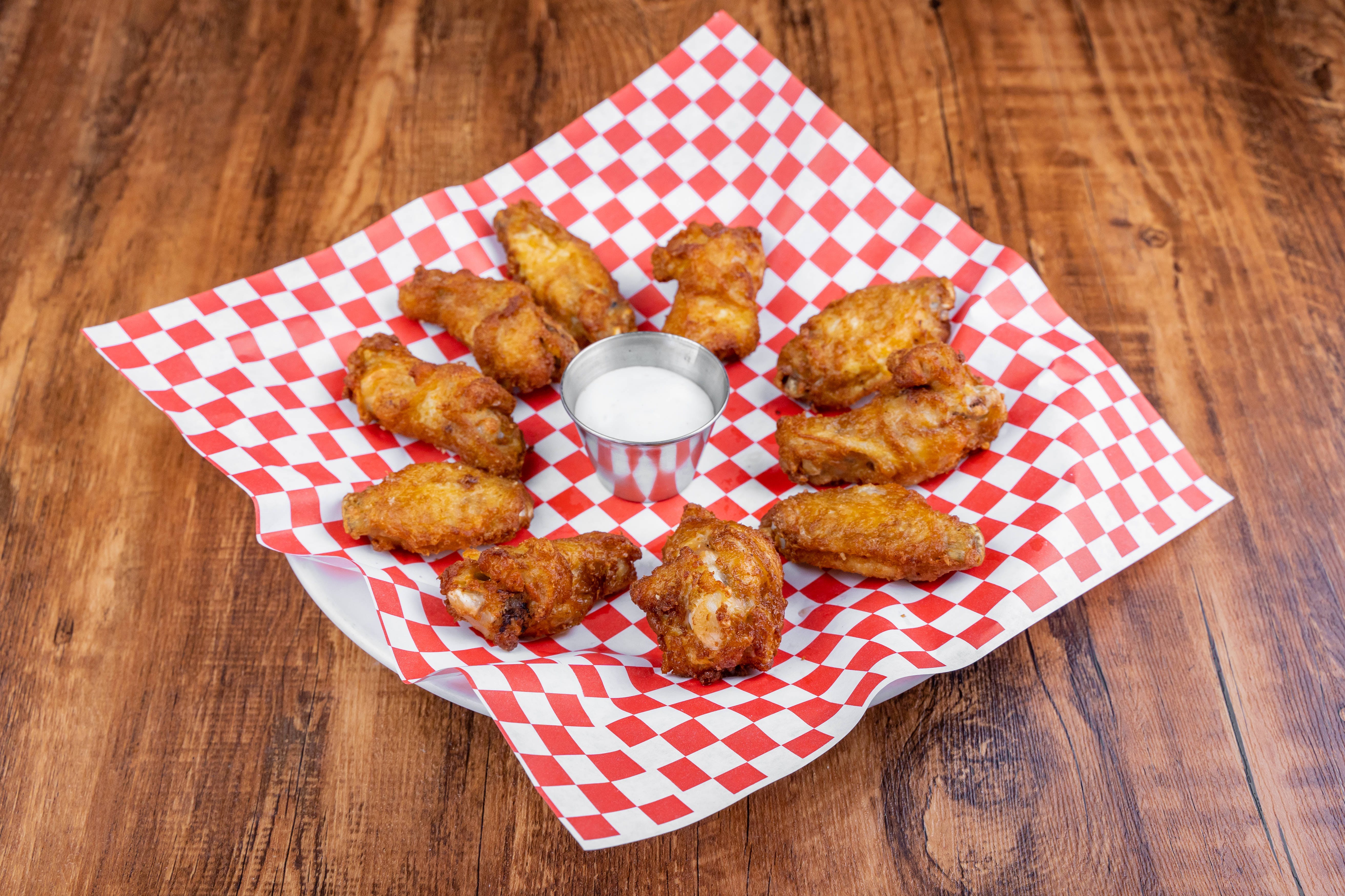 Order Chicken Wings - Appetizer food online from North Beach Pizza store, San Francisco on bringmethat.com