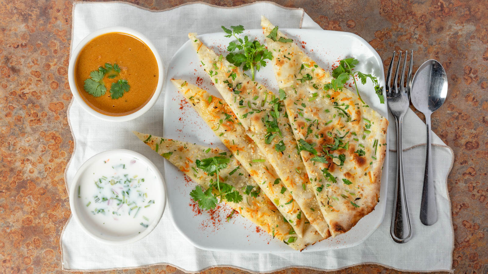 Order Garlic Naan food online from Hyderabad House store, Indianapolis on bringmethat.com