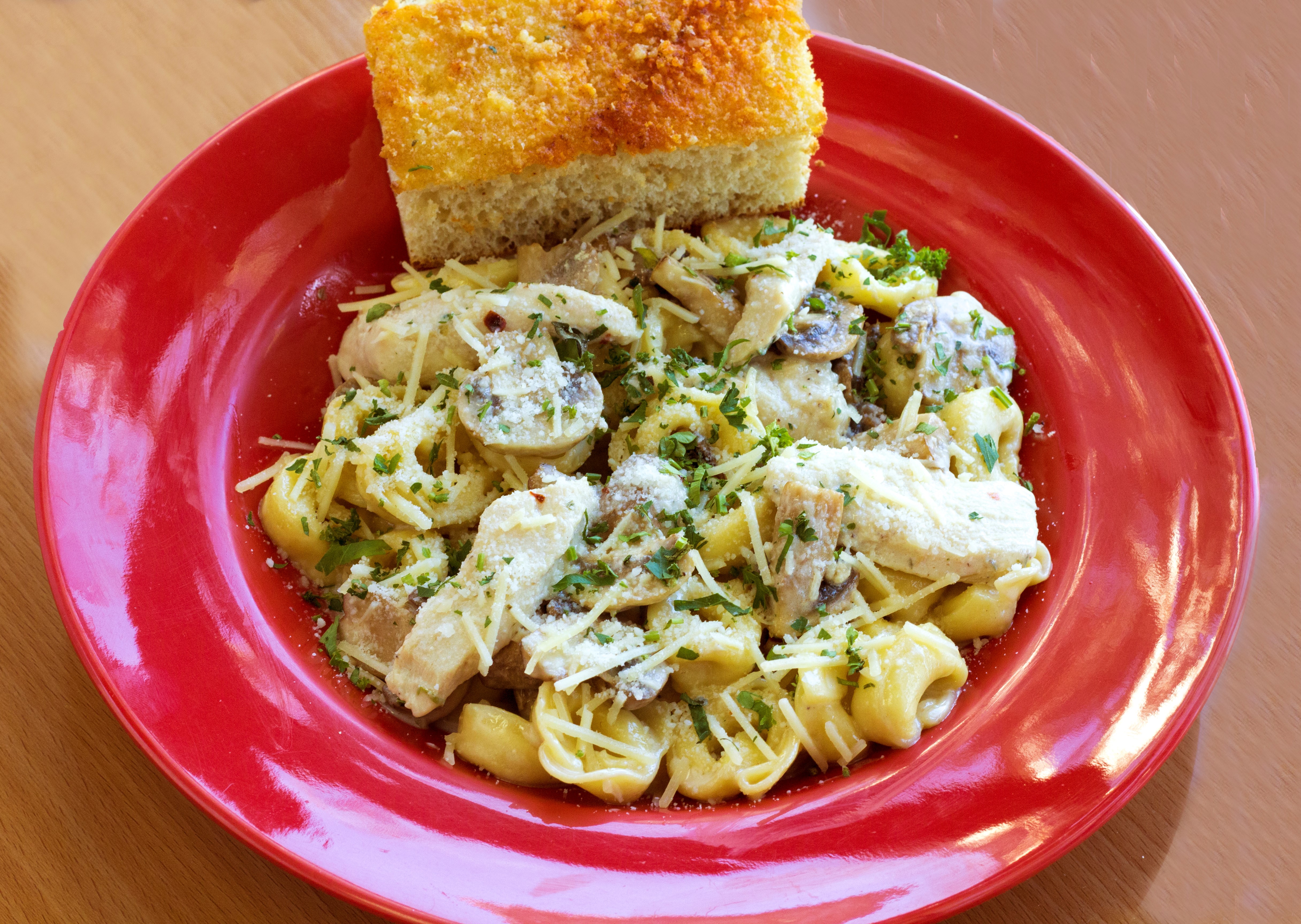 Order Tortellini Pollo food online from Primo Pizza & Pasta store, Carlsbad on bringmethat.com