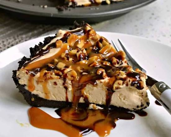Order Caramel Peanut Butter Pie with Snickers food online from FFK Quick Eats store, Lilburn on bringmethat.com