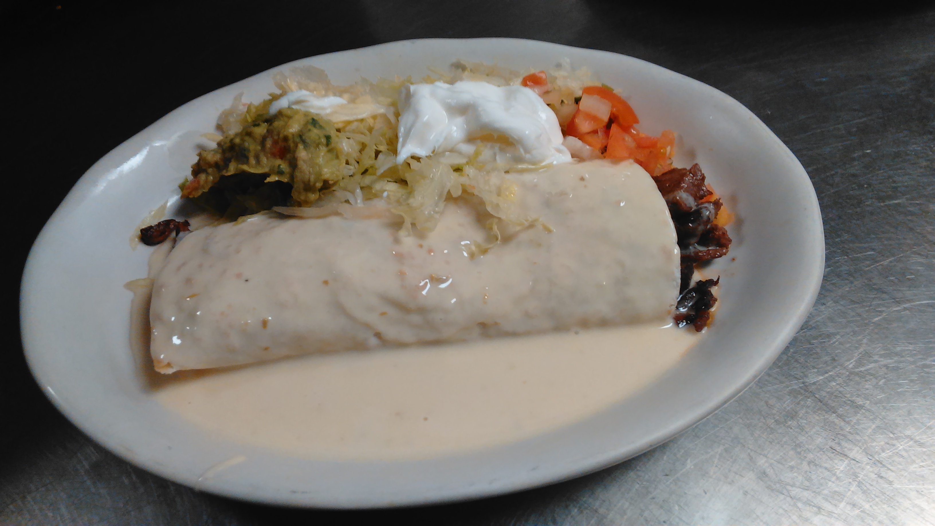 Order Burrito Carne Azada food online from La Fiesta Charra store, Sioux City on bringmethat.com