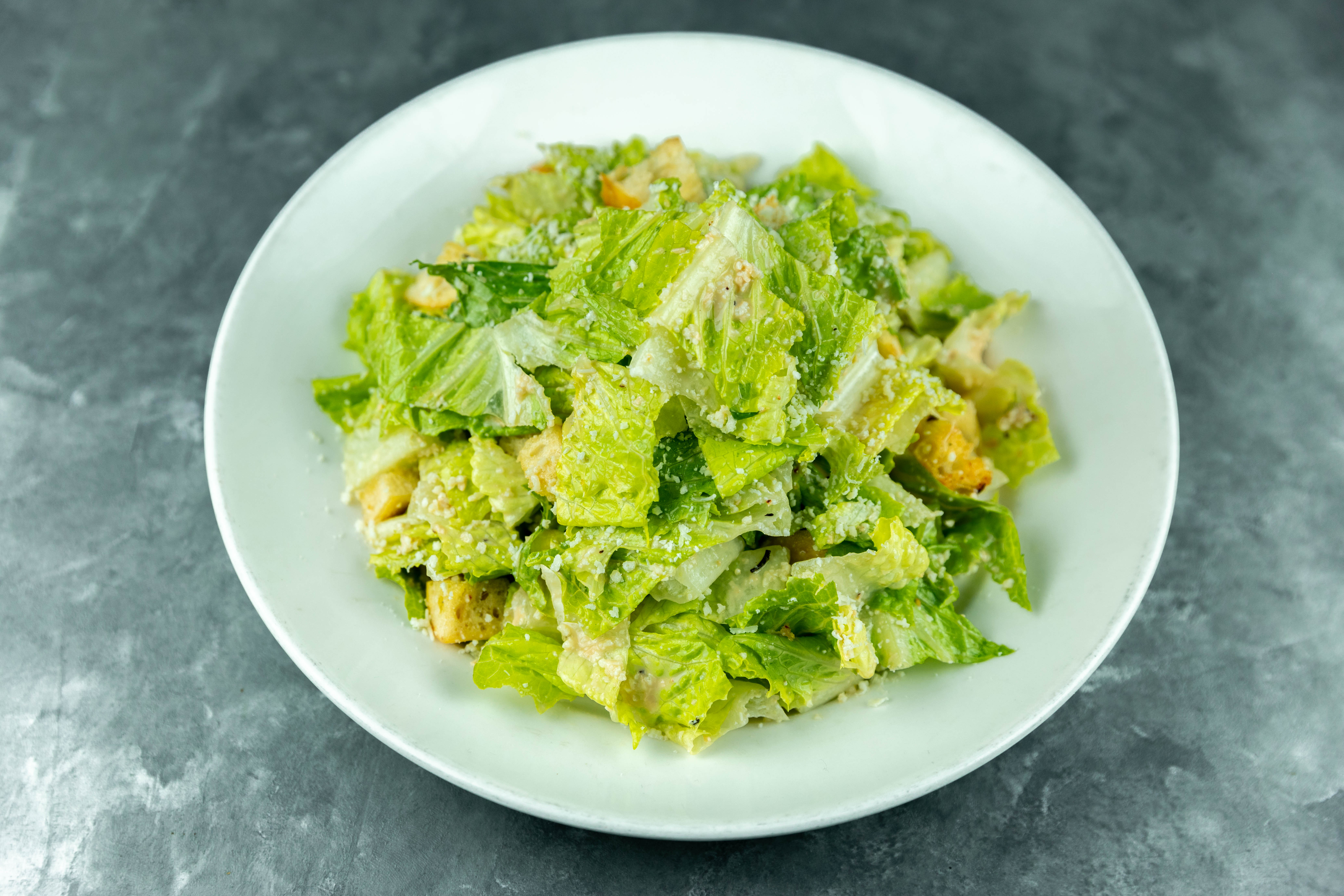 Order Patxi's Caesar Salad food online from Patxi Pizza store, Livermore on bringmethat.com