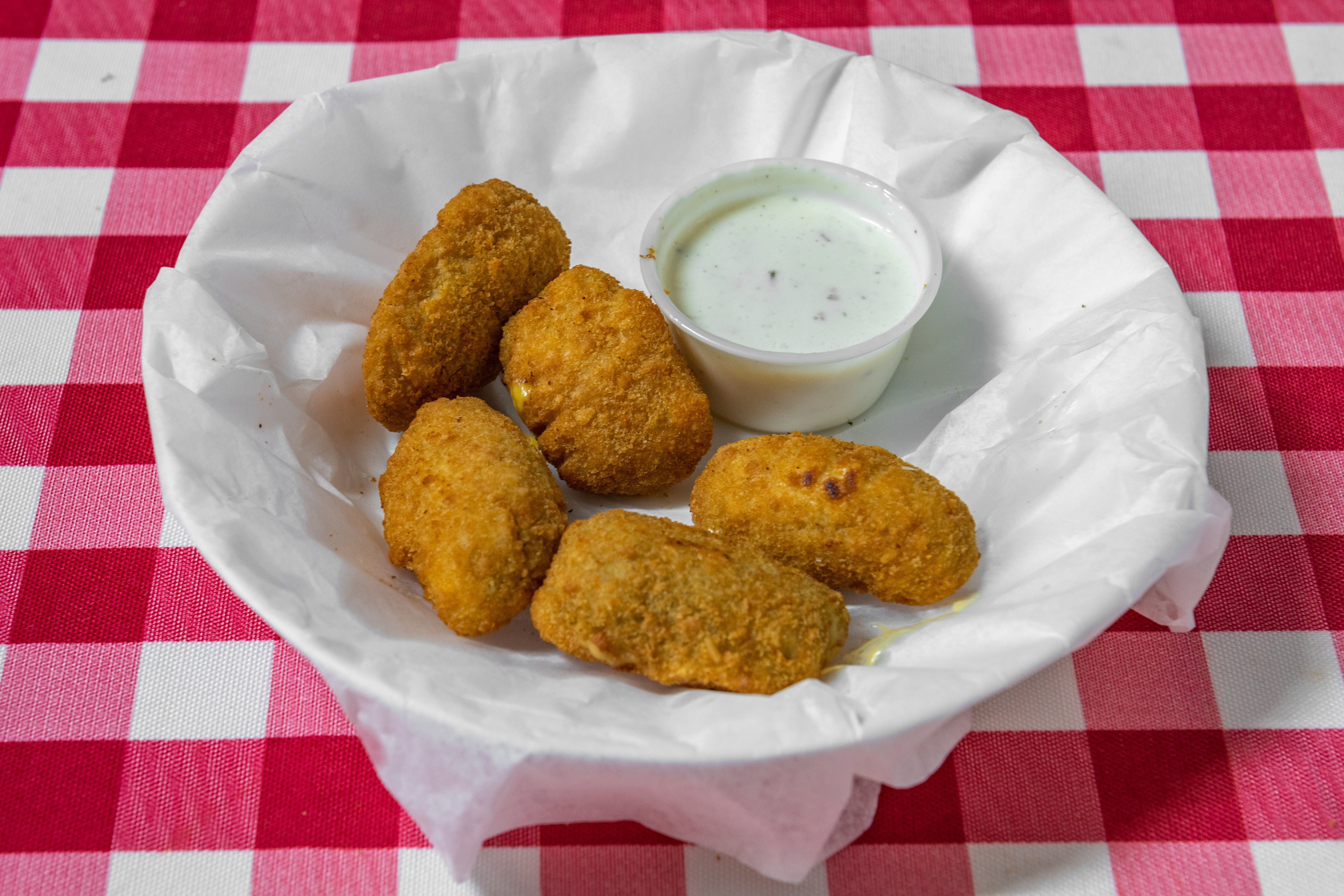 Order Jalapeno Poppers - 5 Pieces food online from Sunny's Pizza store, San Marcos on bringmethat.com