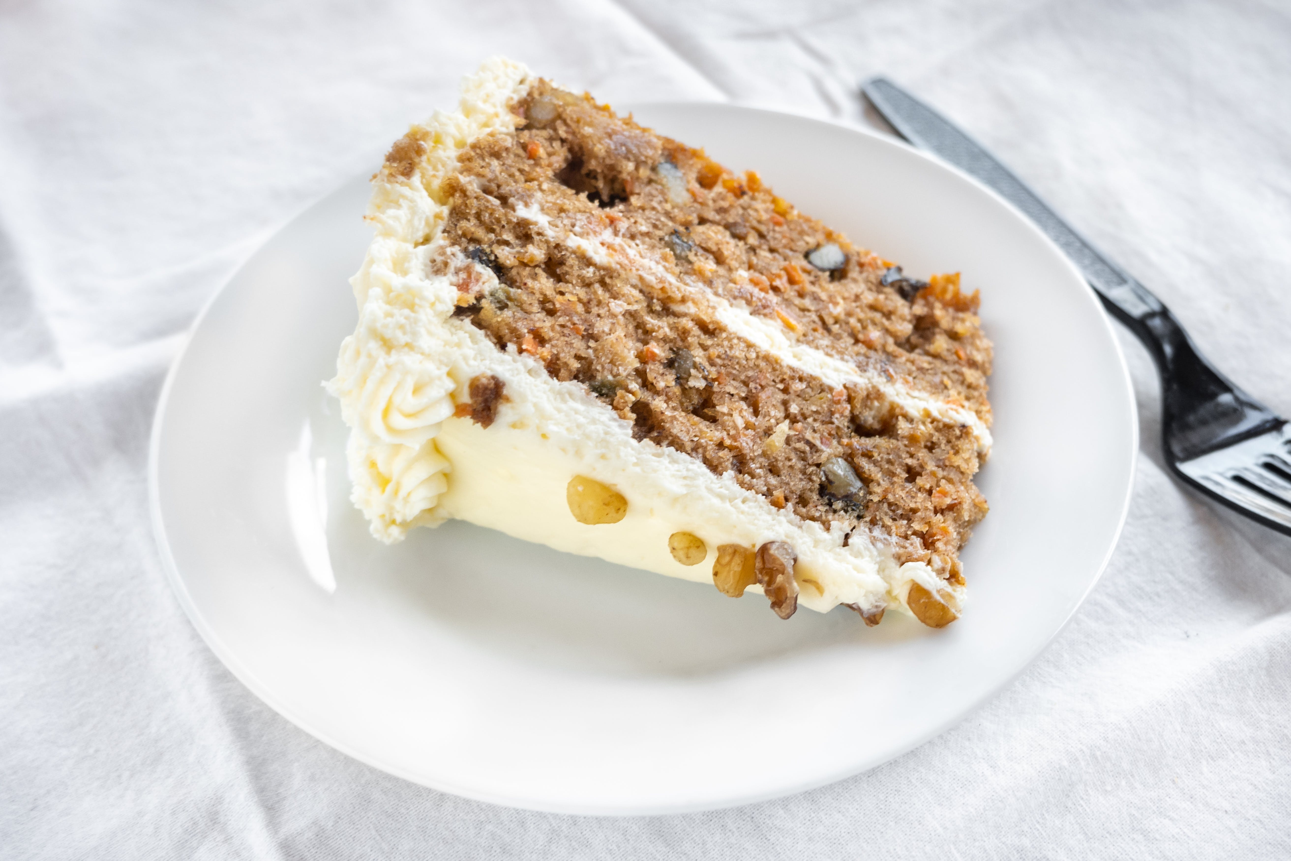 Order Carrot Cake - Dessert food online from New Tiny's Grill store, Media on bringmethat.com