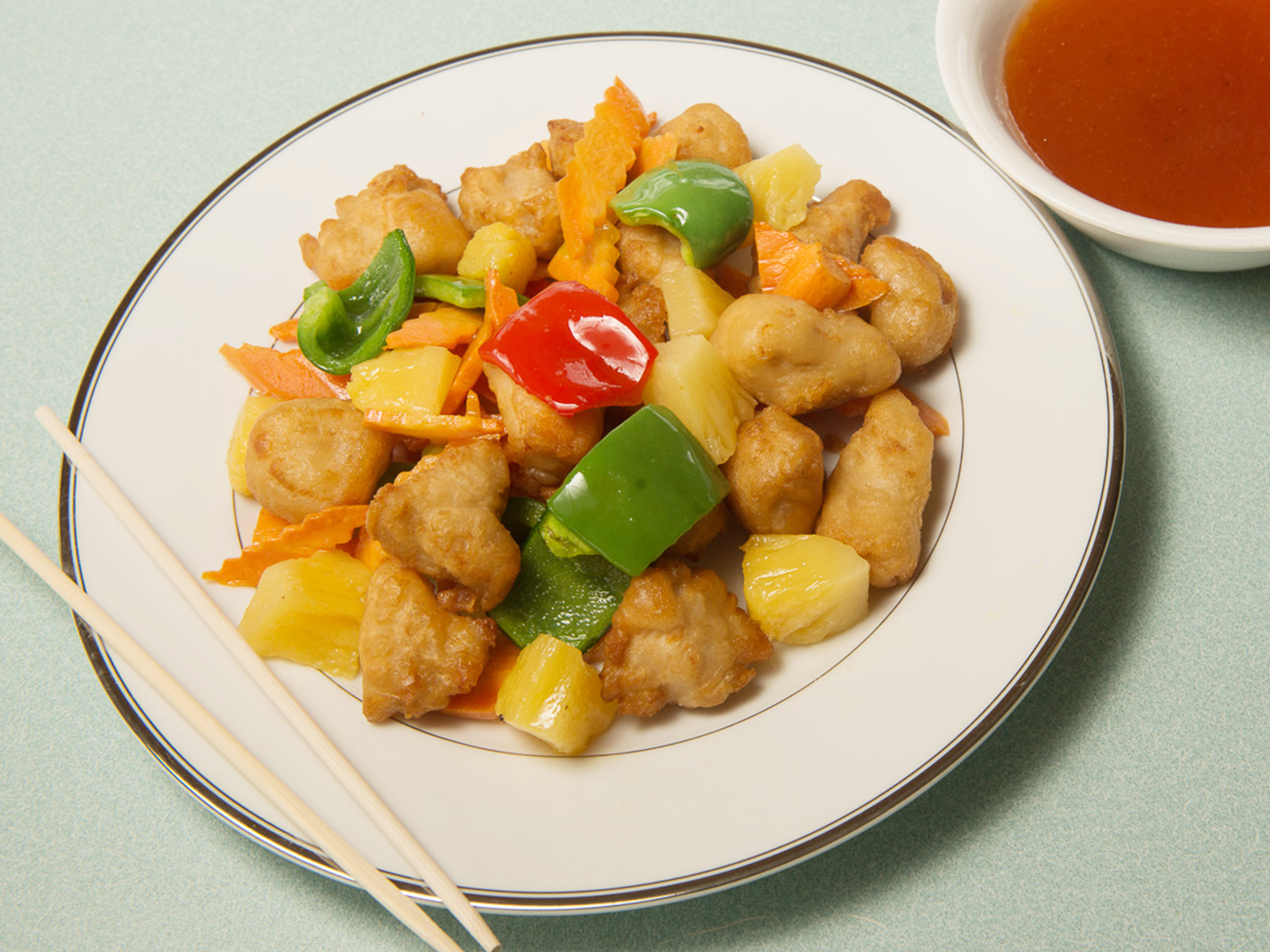 Order Sweet and Sour Chicken food online from Hot Wok Cafe store, Fort Collins on bringmethat.com
