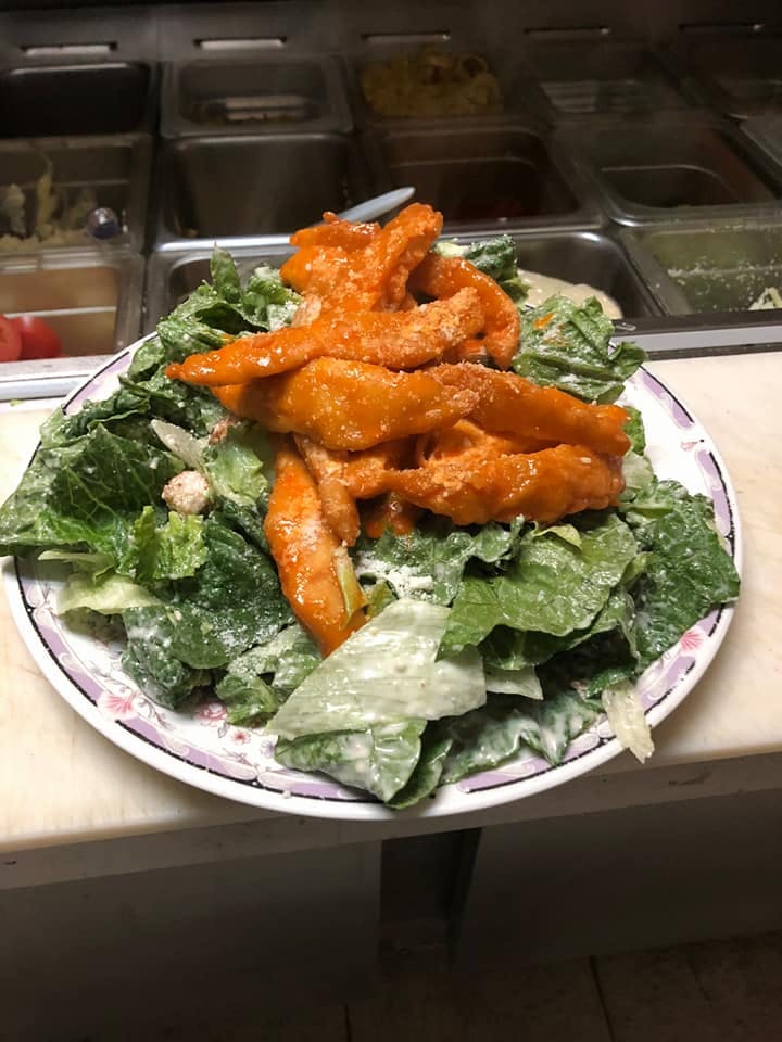 Order Buffalo Chicken Caesar Salad - Salad food online from Kenny Pizzeria & Deli store, Old Saybrook on bringmethat.com