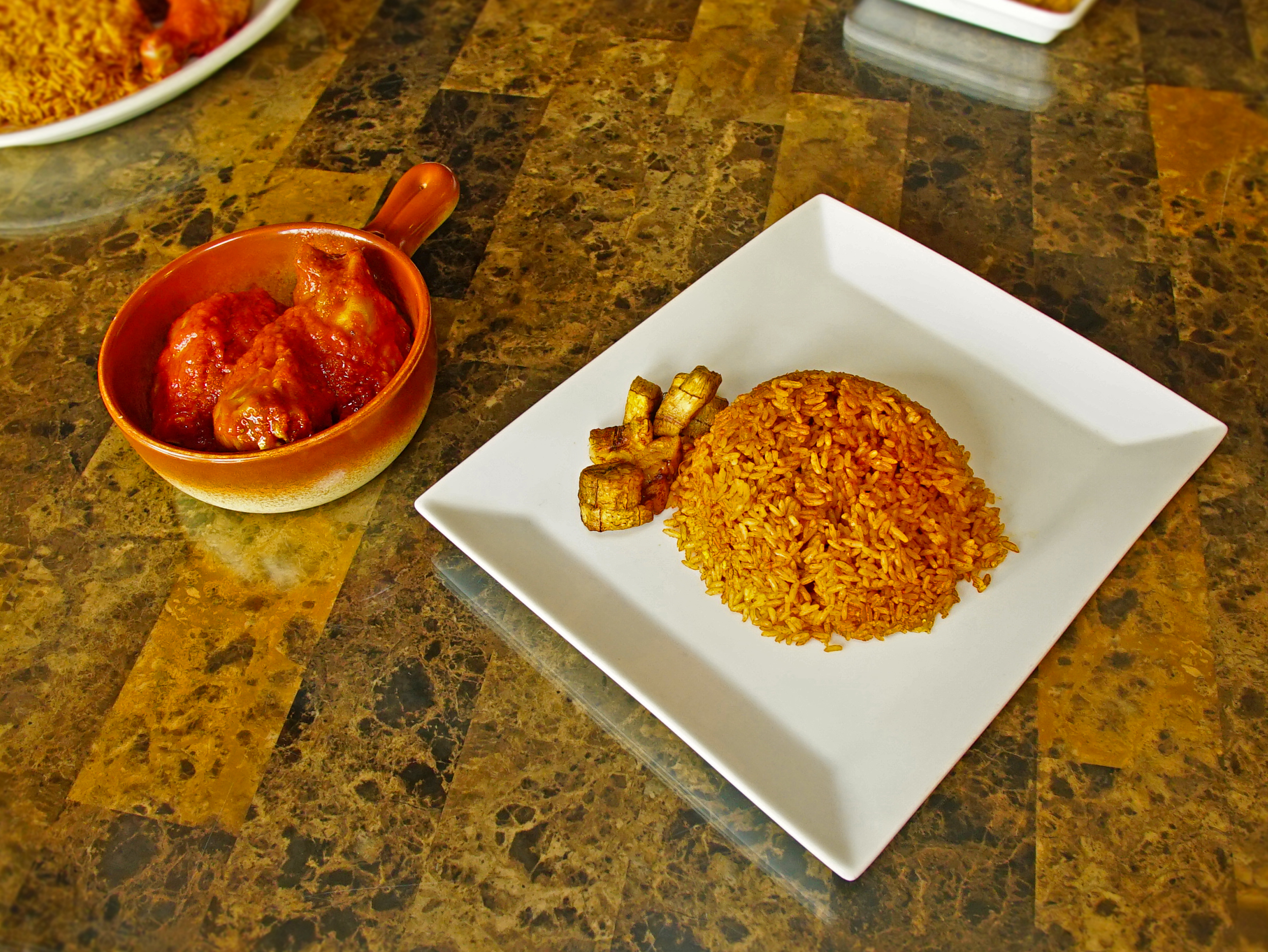 Order Jollof Rice( Vegan) food online from Totos’ African Cuisine store, Van Nuys on bringmethat.com