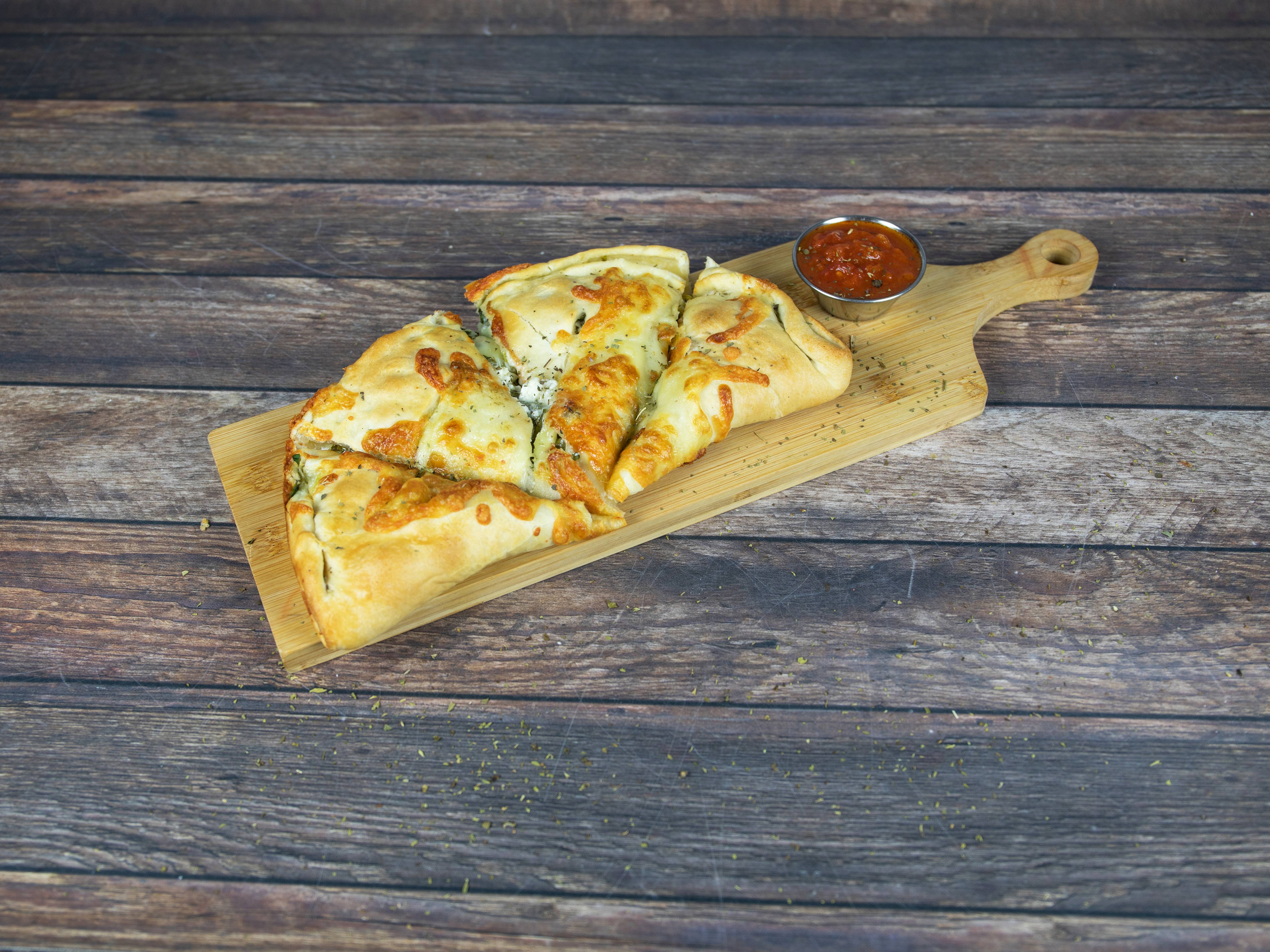 Order Spinach and Feta Calzone food online from Nick Place store, Salisbury on bringmethat.com