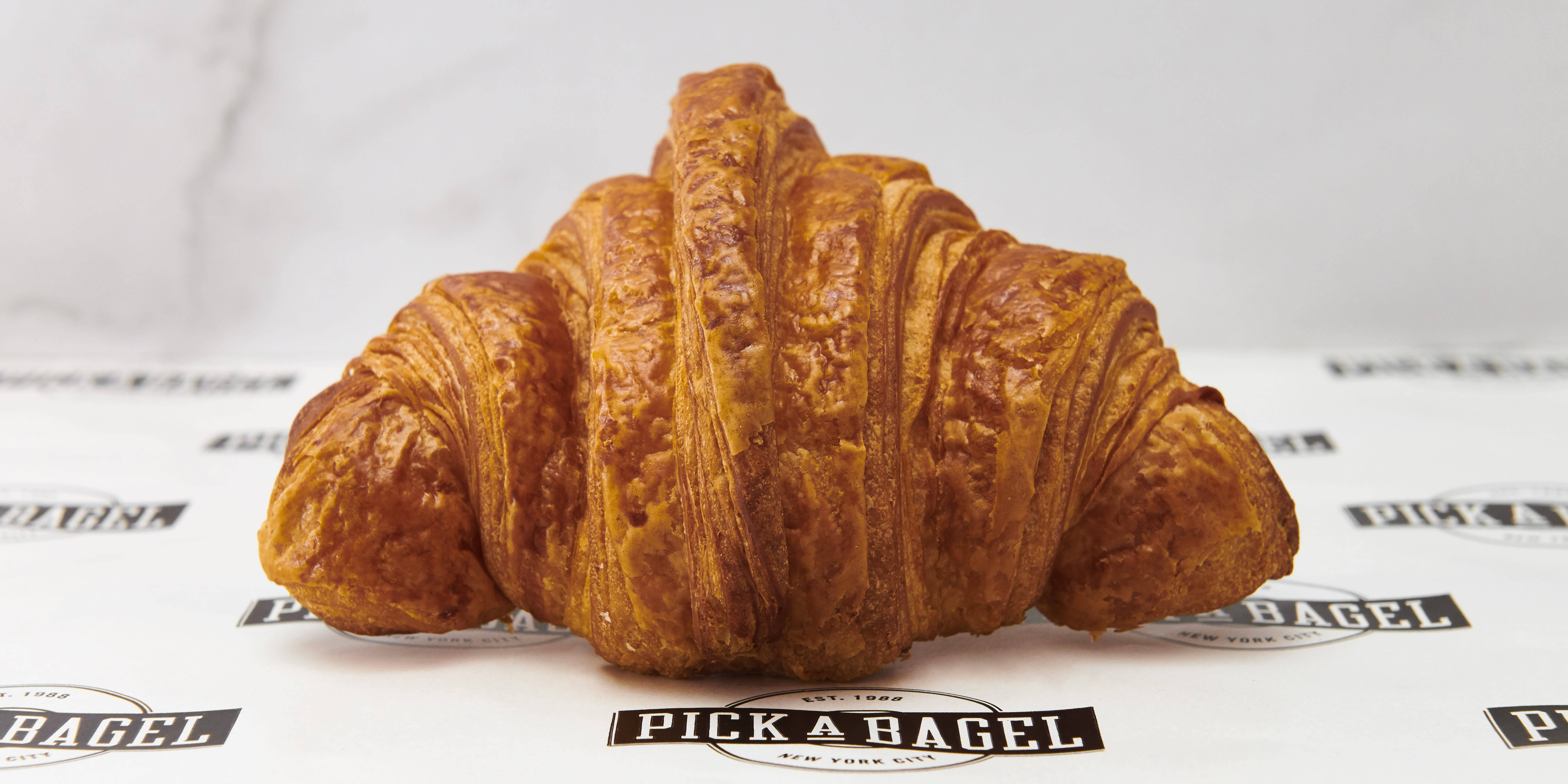 Order Plain Croissant food online from Pick a Bagel store, New York on bringmethat.com