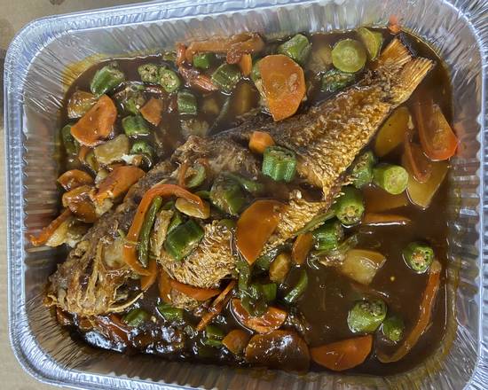 Order Brown Stew Fish food online from Island Tingz Caribbean Grill store, Humble, Houston on bringmethat.com