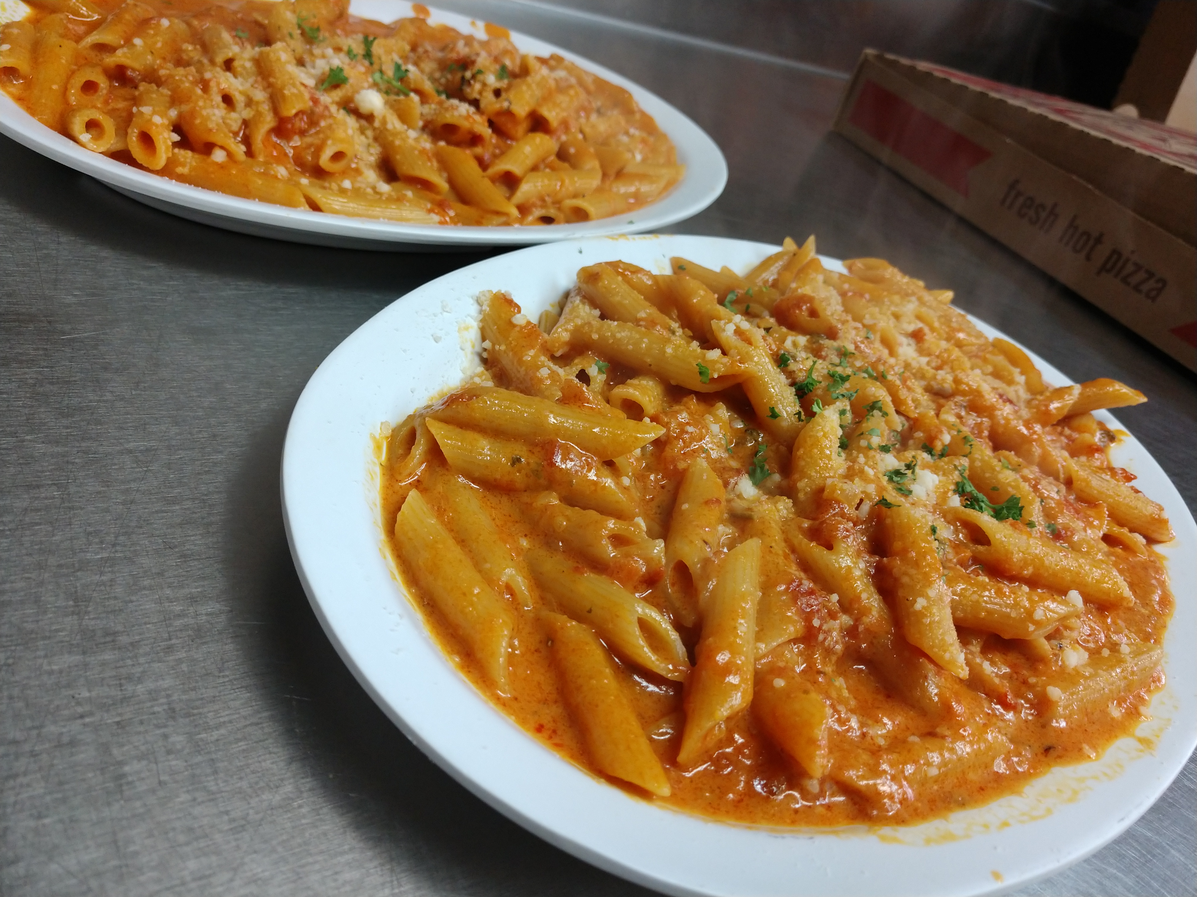 Order Penne ala Vodka food online from Pizzarelli's Pizza store, Scarsdale on bringmethat.com
