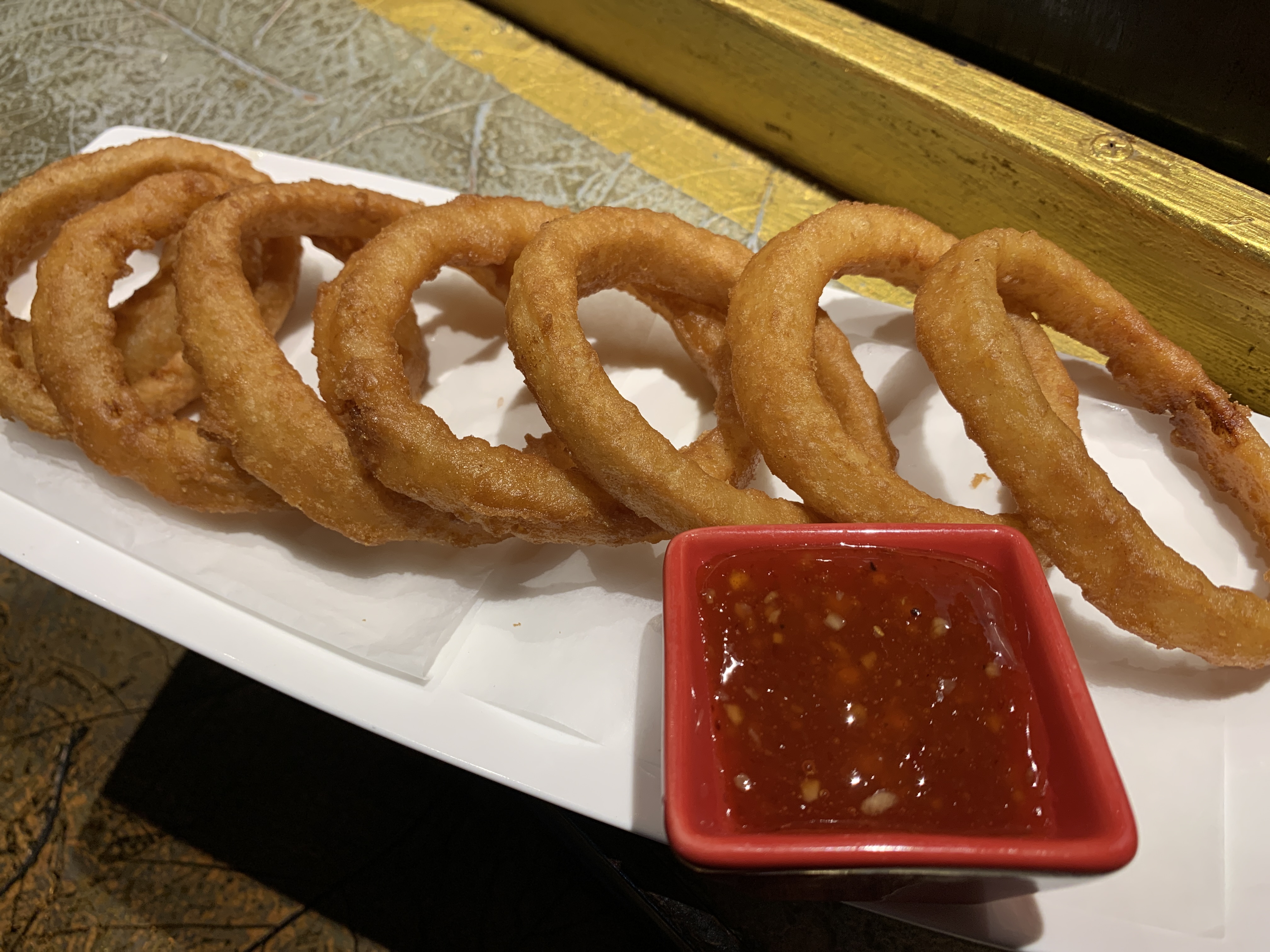 Order Onion Rings (K-49) food online from Blue Fin Sushi store, San Francisco on bringmethat.com