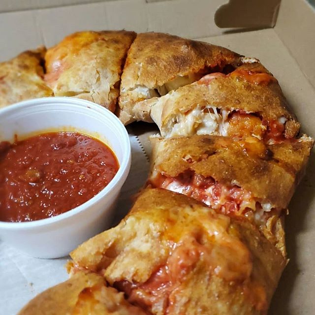 Order Chicken Parm Calzone food online from Nino's Pizza store, Boston on bringmethat.com