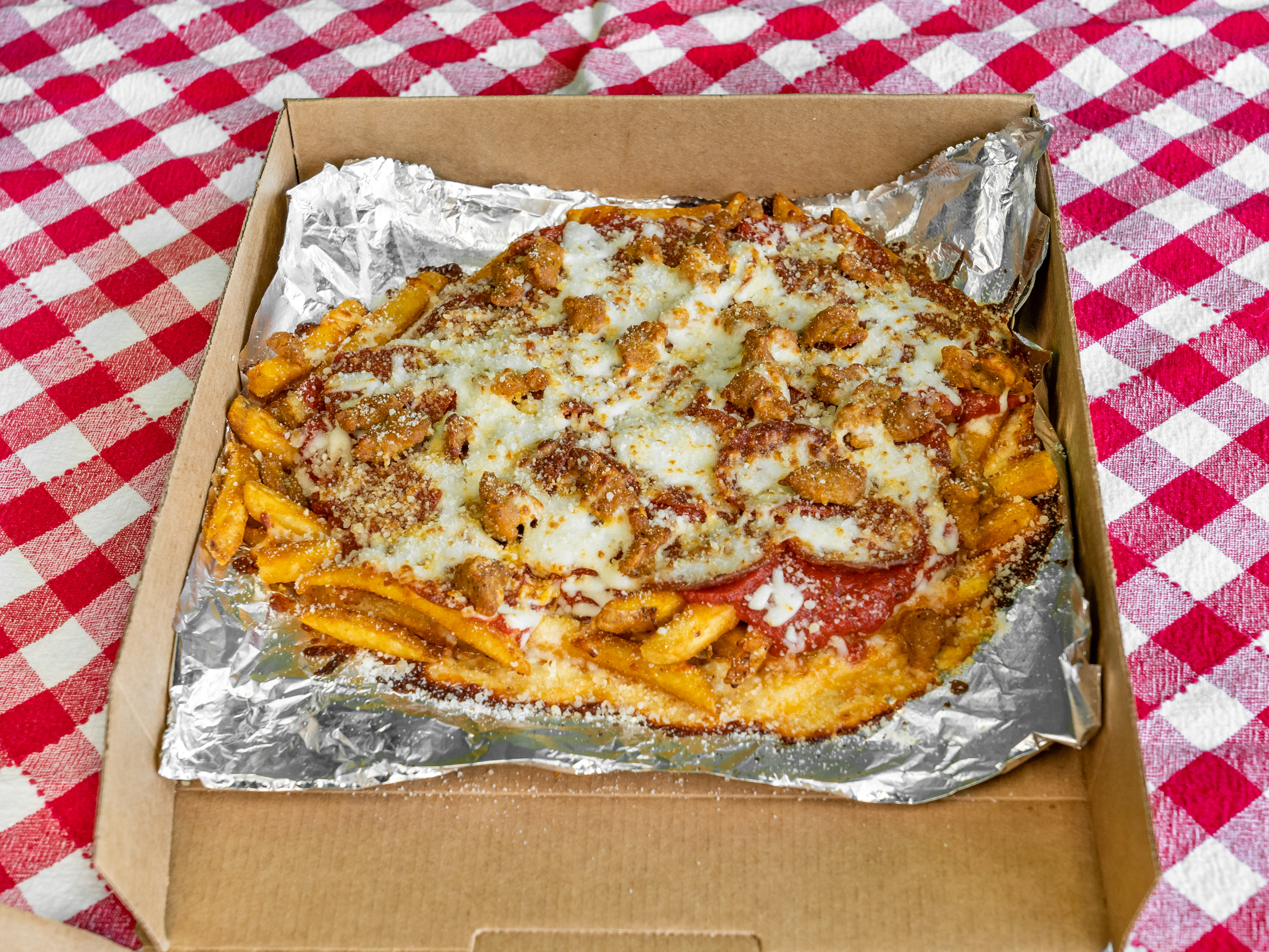 Order Pizza Fries food online from What Up Dough Pizzeria store, Utica on bringmethat.com