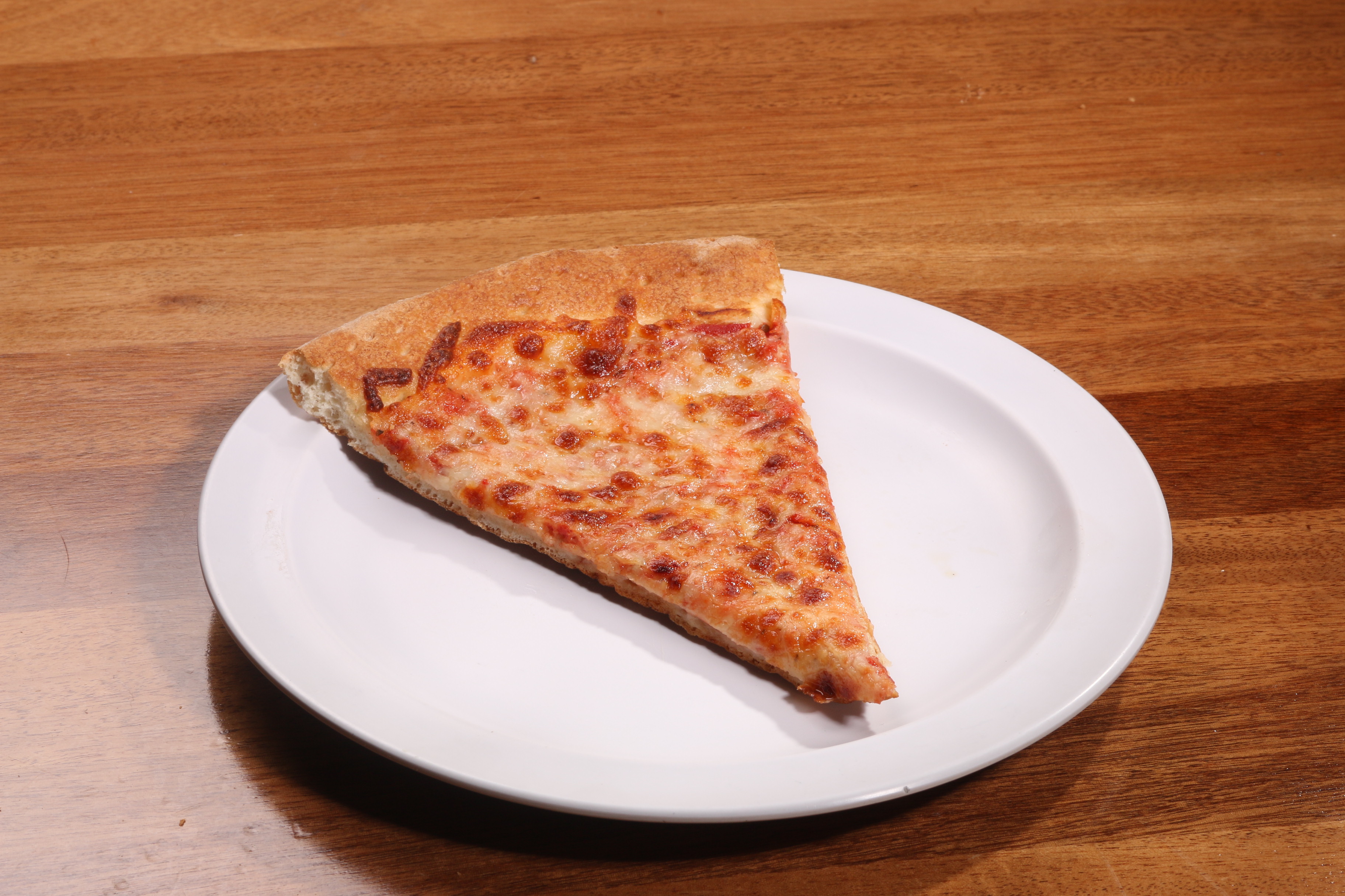 Order Cheese Pizza Slice food online from UnCommon Pizza store, Lititz on bringmethat.com