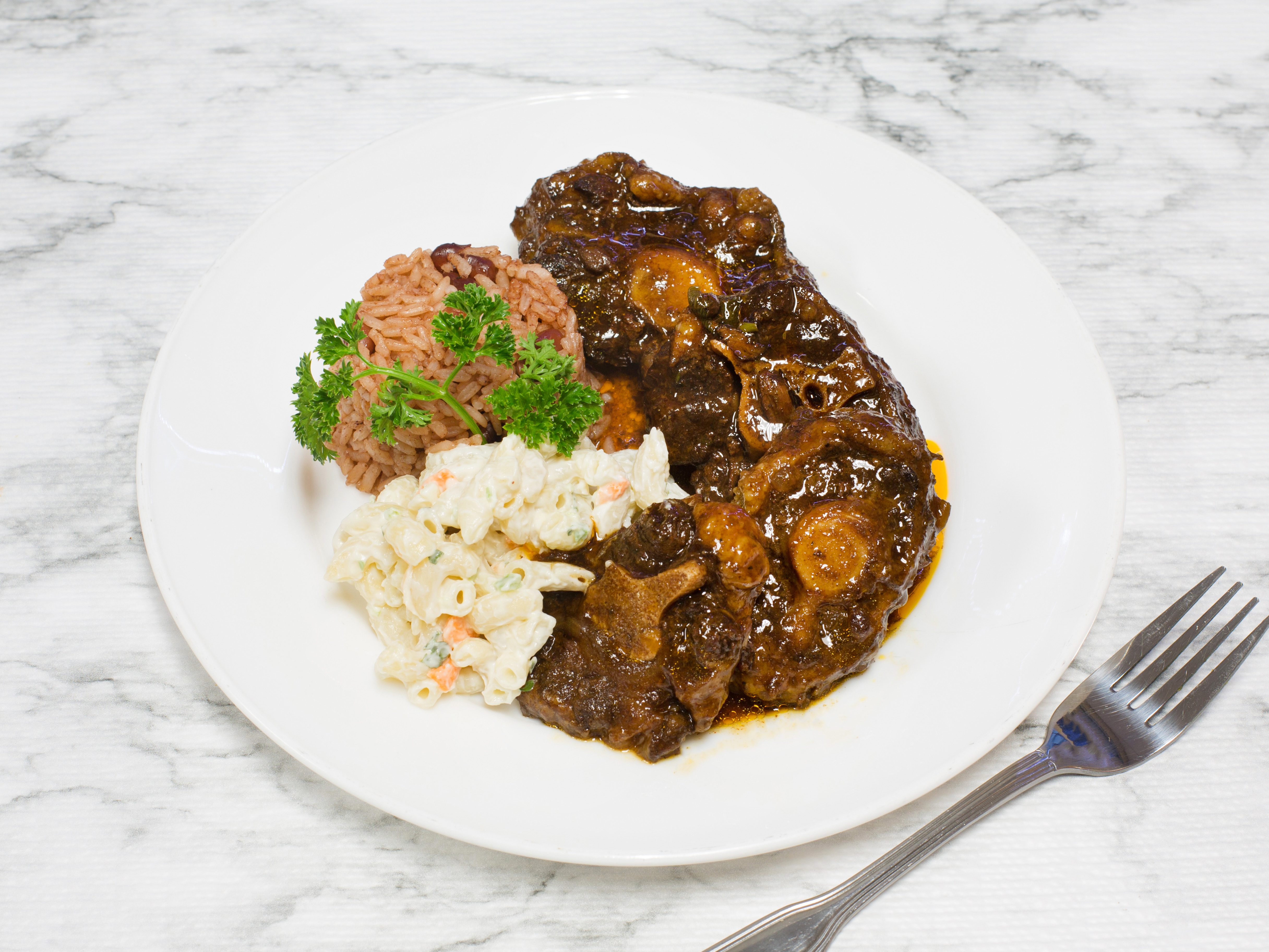 Order Oxtail food online from Jam Icon Jamaican Resturant store, Newark on bringmethat.com