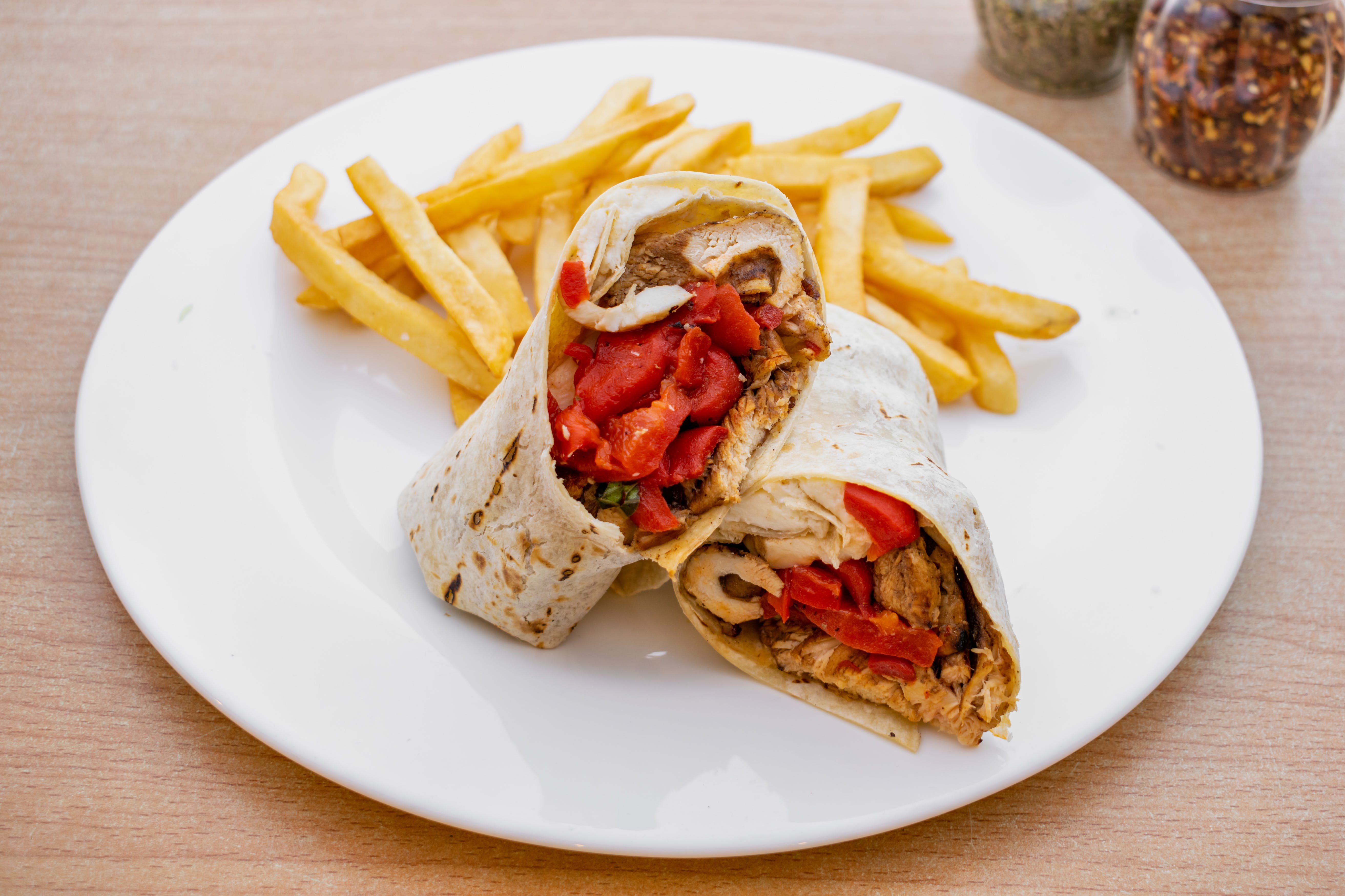 Order Chicken Italiano Wrap - Wrap food online from Dusals store, Milltown on bringmethat.com
