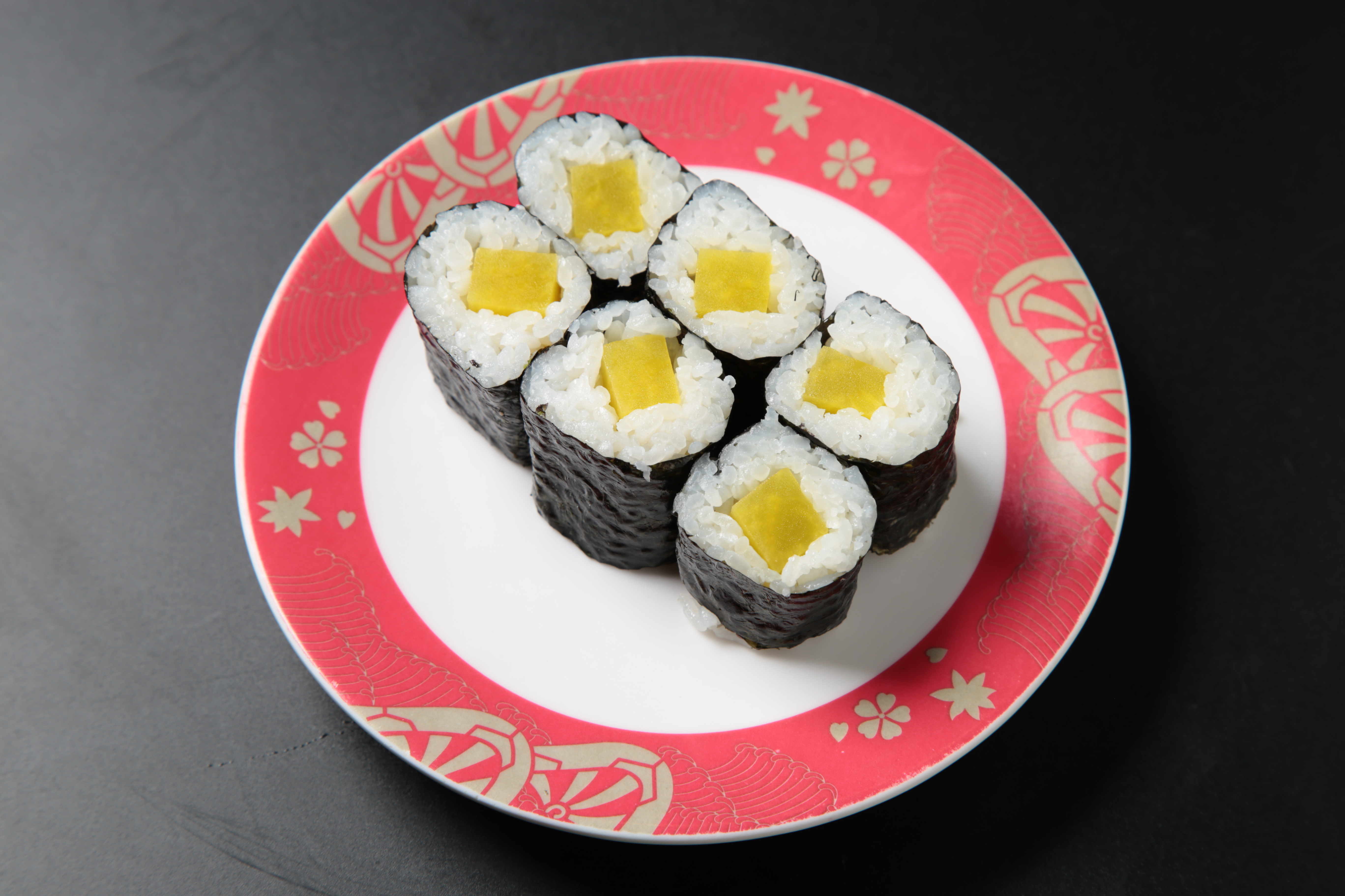 Order Pickled Radish Roll (6 pcs) food online from Izumi Revolving Sushi store, Daly City on bringmethat.com
