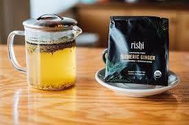 Order Golden Tumeric Tea - 12oz food online from Daylight Donuts Op store, Overland Park on bringmethat.com