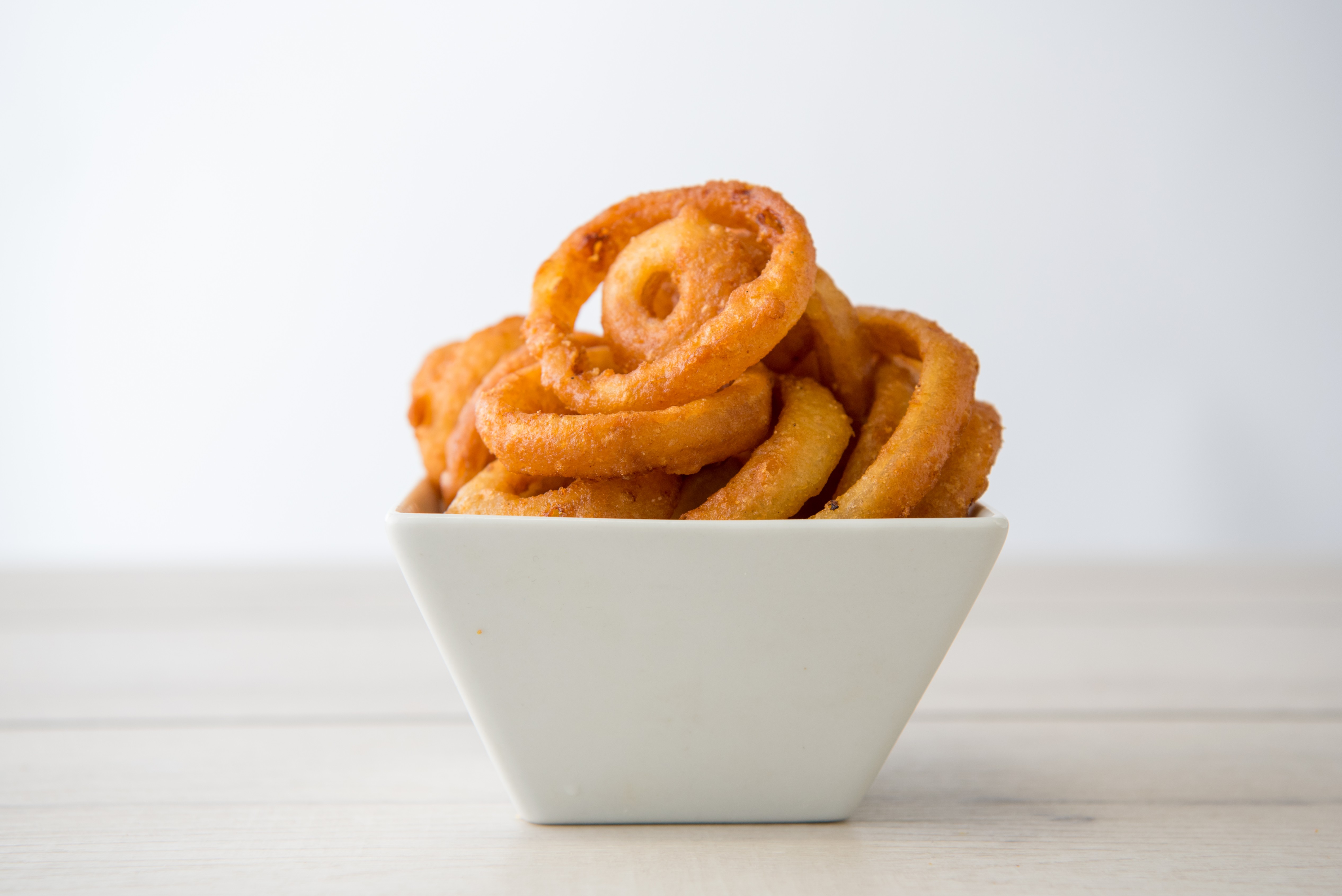 Order Beer Battered Onion Rings food online from Grilled Cheese Heaven store, Los Angeles on bringmethat.com