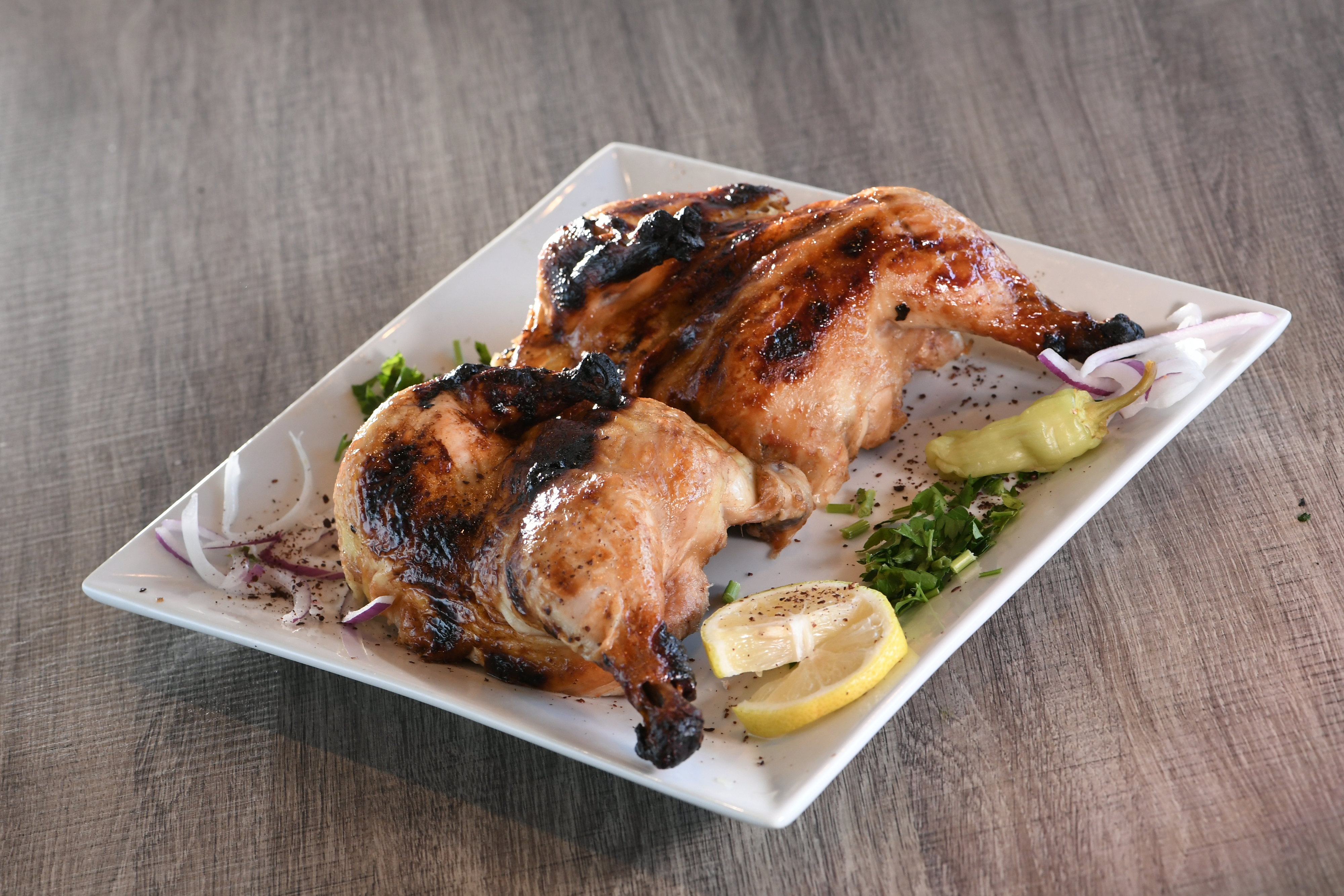Order Whole Rotisserie Chicken food online from Kababchi Grill store, San Antonio on bringmethat.com