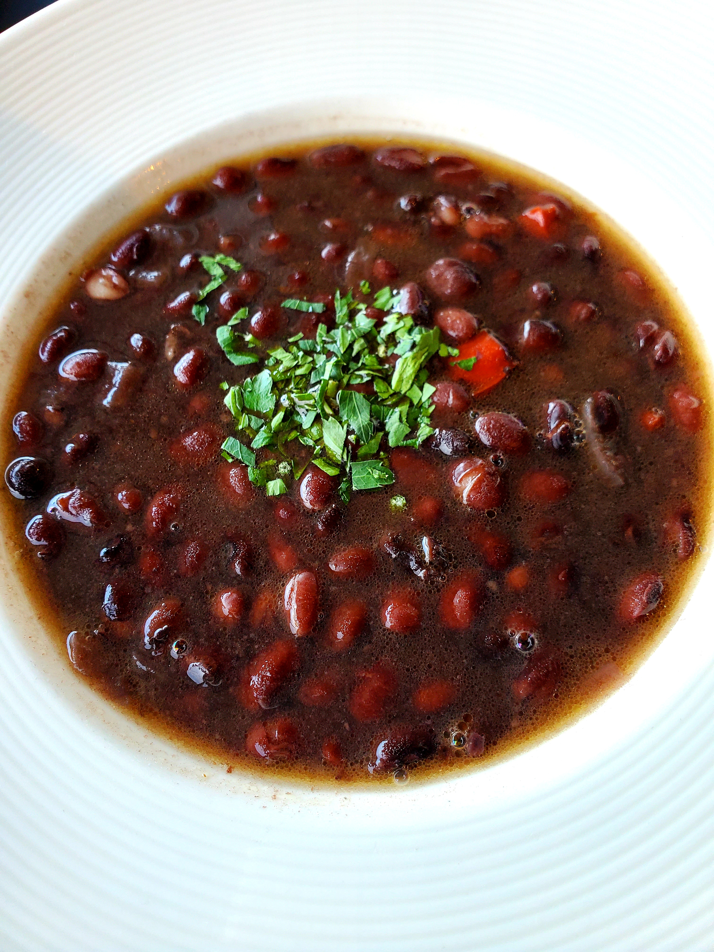 Order Cup of Cuban Black Beans food online from Cafe Con Leche store, Seattle on bringmethat.com