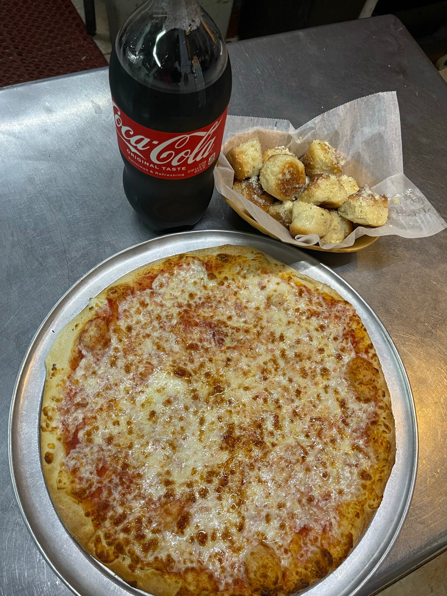 Order Large Cheese Pizza 16”, Dozen Garlic Rolls & 2 Liter Soda Special - Special food online from Manhattan Chicago Pizza Kendall store, Miami on bringmethat.com