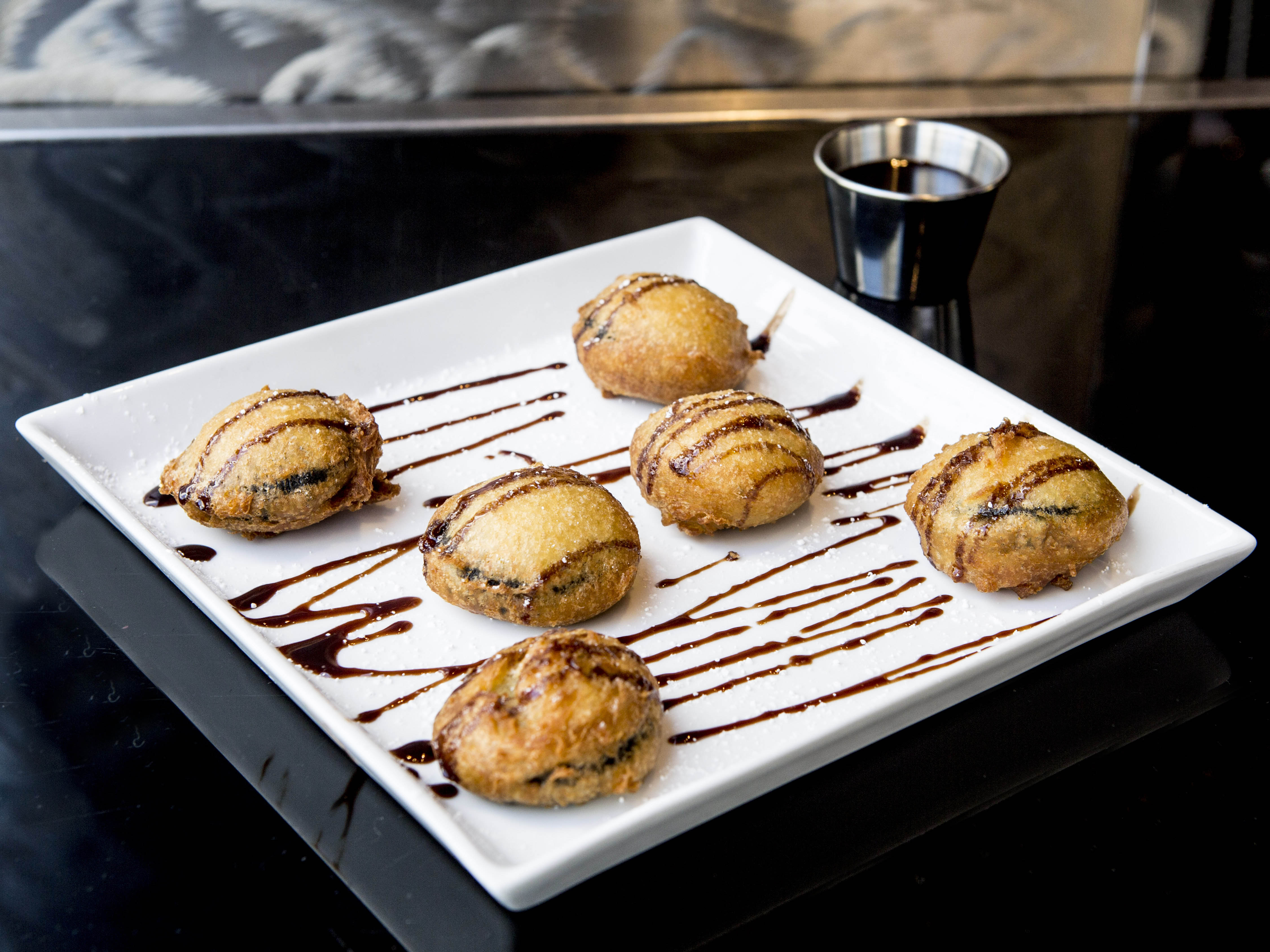 Order Fried Oreos food online from Moonstruck Eatery store, New York on bringmethat.com