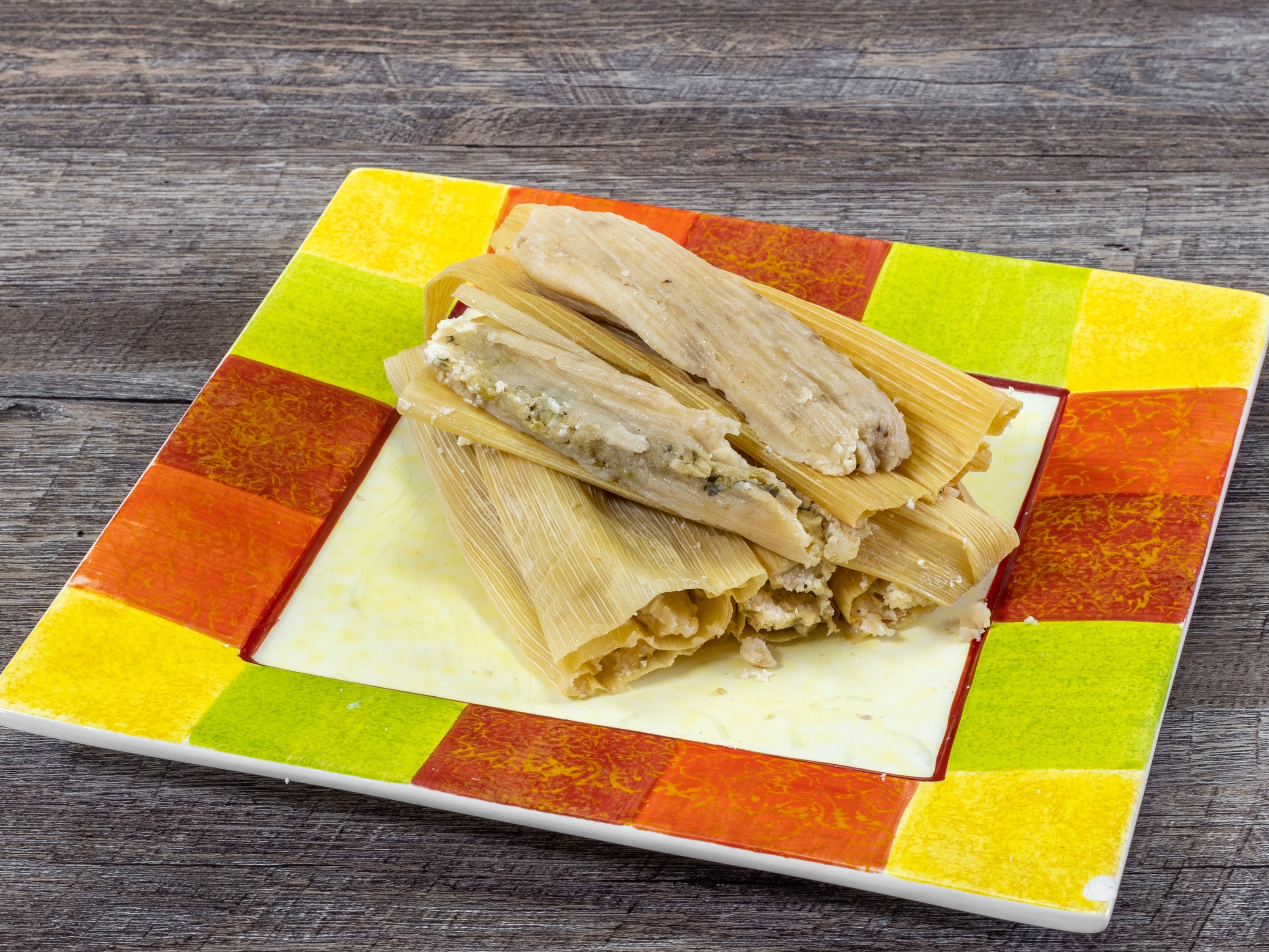 Order Tomatillo Chicken and Cheese Tamale  food online from Delicious Tamales store, San Antonio on bringmethat.com