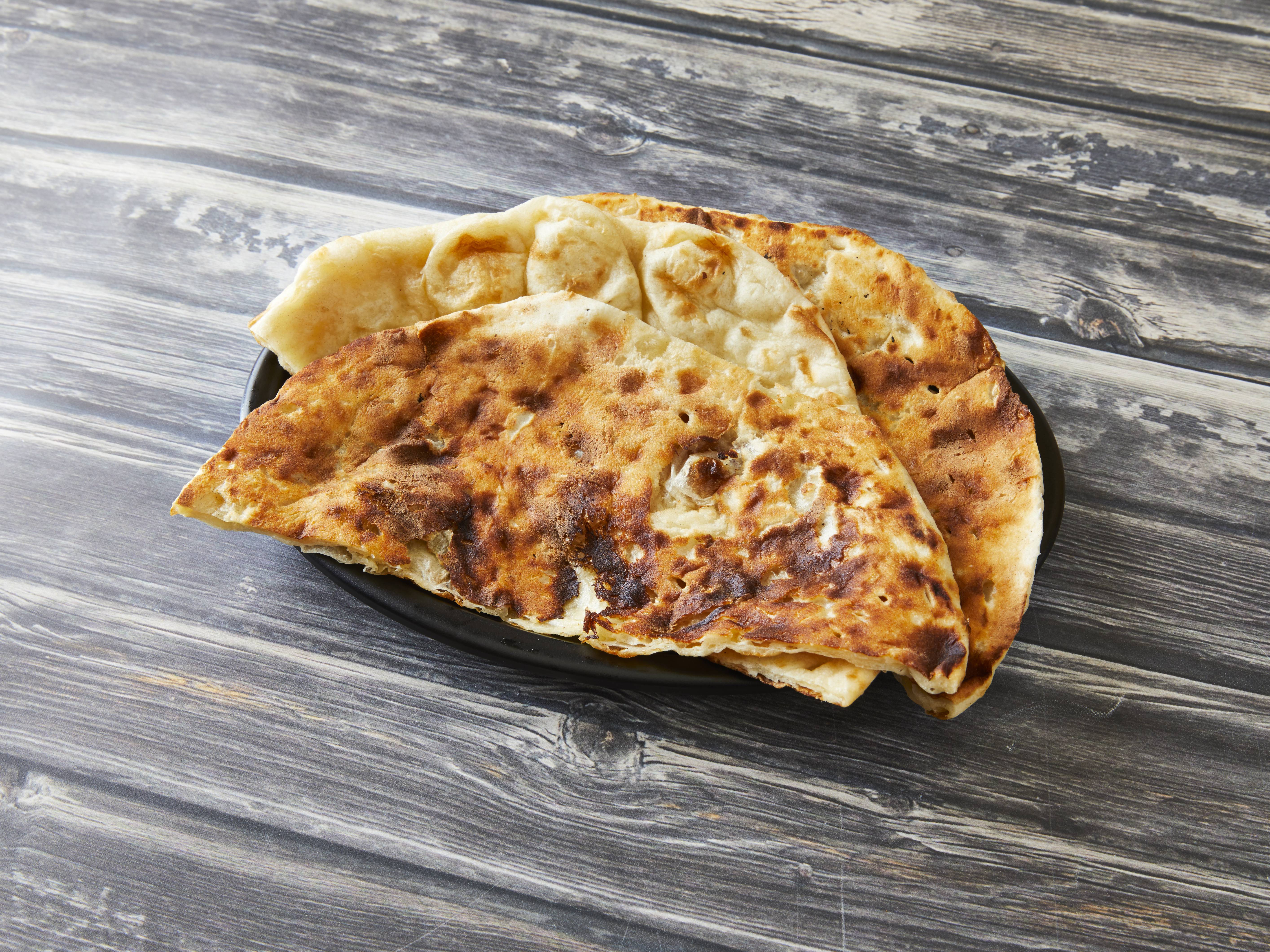 Order Butter Naan food online from Indian Cuisine store, Portage on bringmethat.com