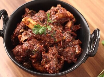 Order Bhuna Goat Masala food online from Peacock Indian Cuisine store, Plano on bringmethat.com