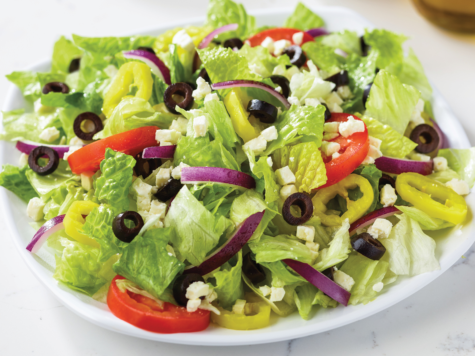 Order Greek Salad food online from Marcos store, Greensboro on bringmethat.com