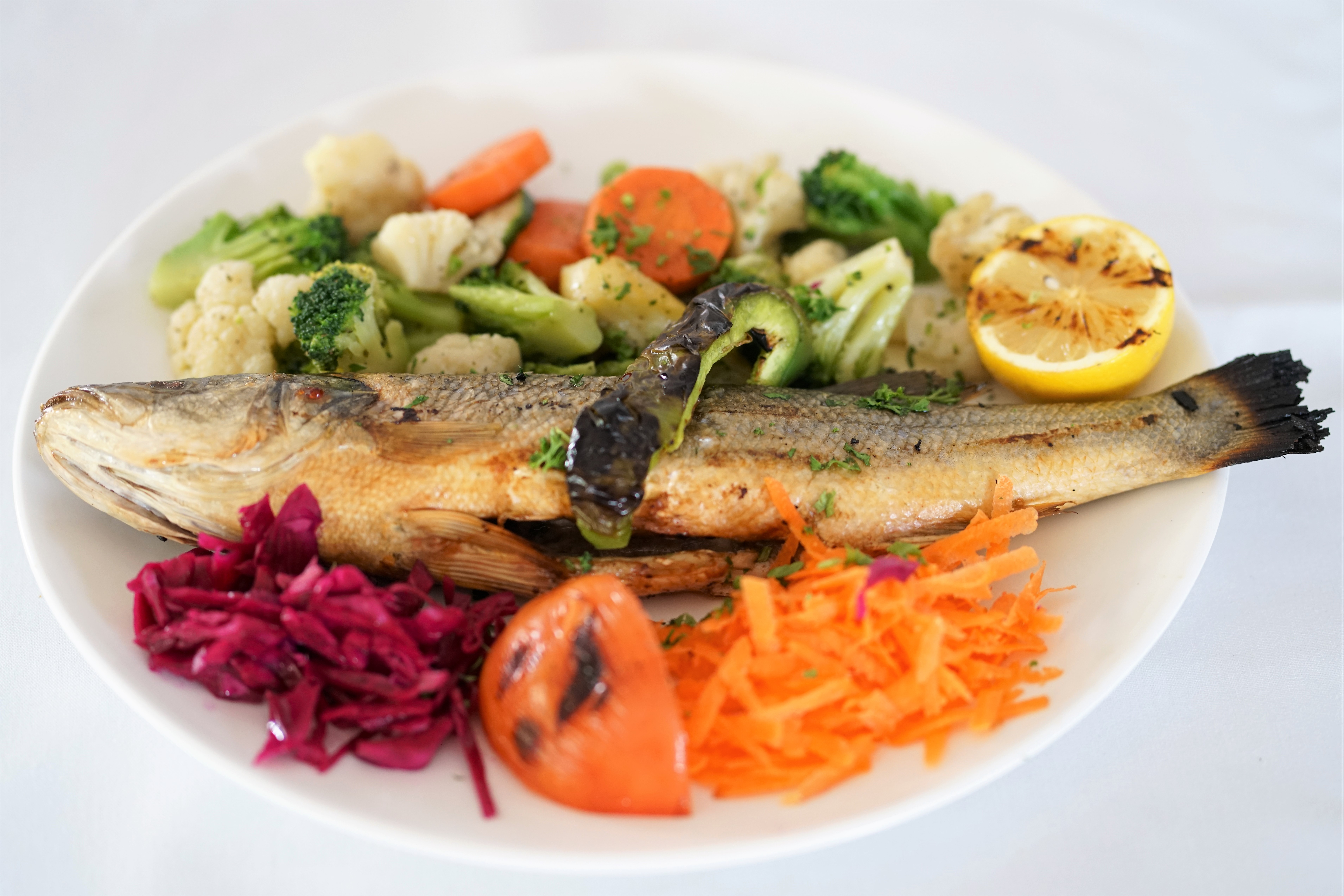 Order Grilled Whole Mediterranean Sea Bass food online from Lezzet Restaurant store, Centreville on bringmethat.com