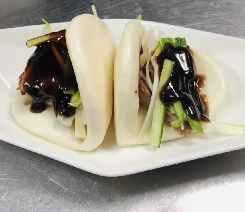 Order Peking Duck Buns - 2 pcs food online from The Bund store, Forest Hills on bringmethat.com