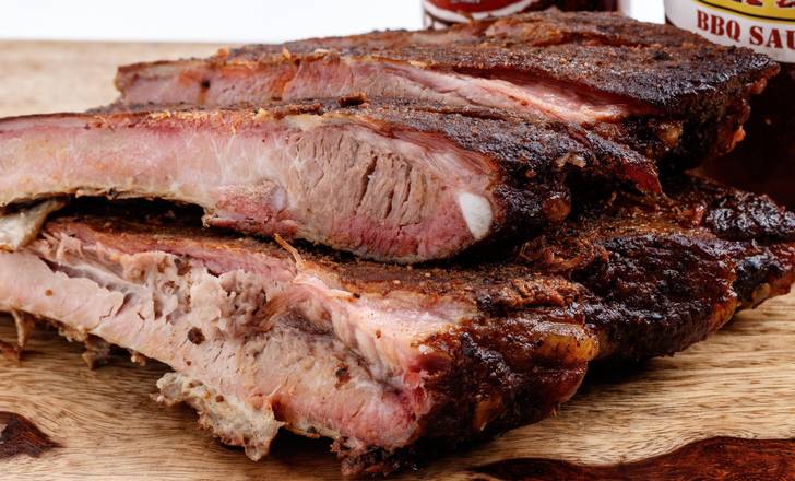 Order Ribs food online from Boomtown BBQ store, Beaumont on bringmethat.com