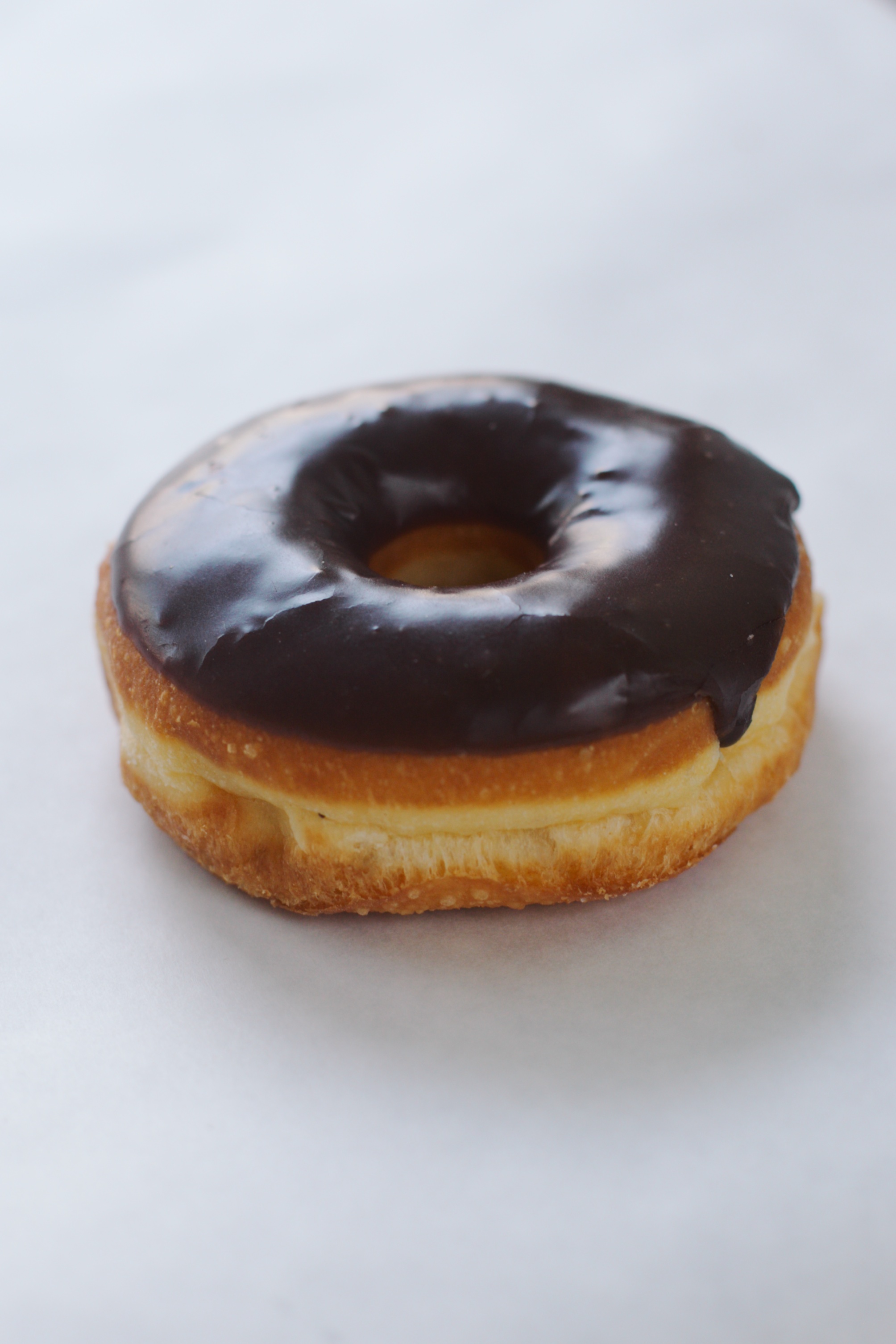 Order Chocolate Glaze food online from Smile Donuts store, Hurst on bringmethat.com