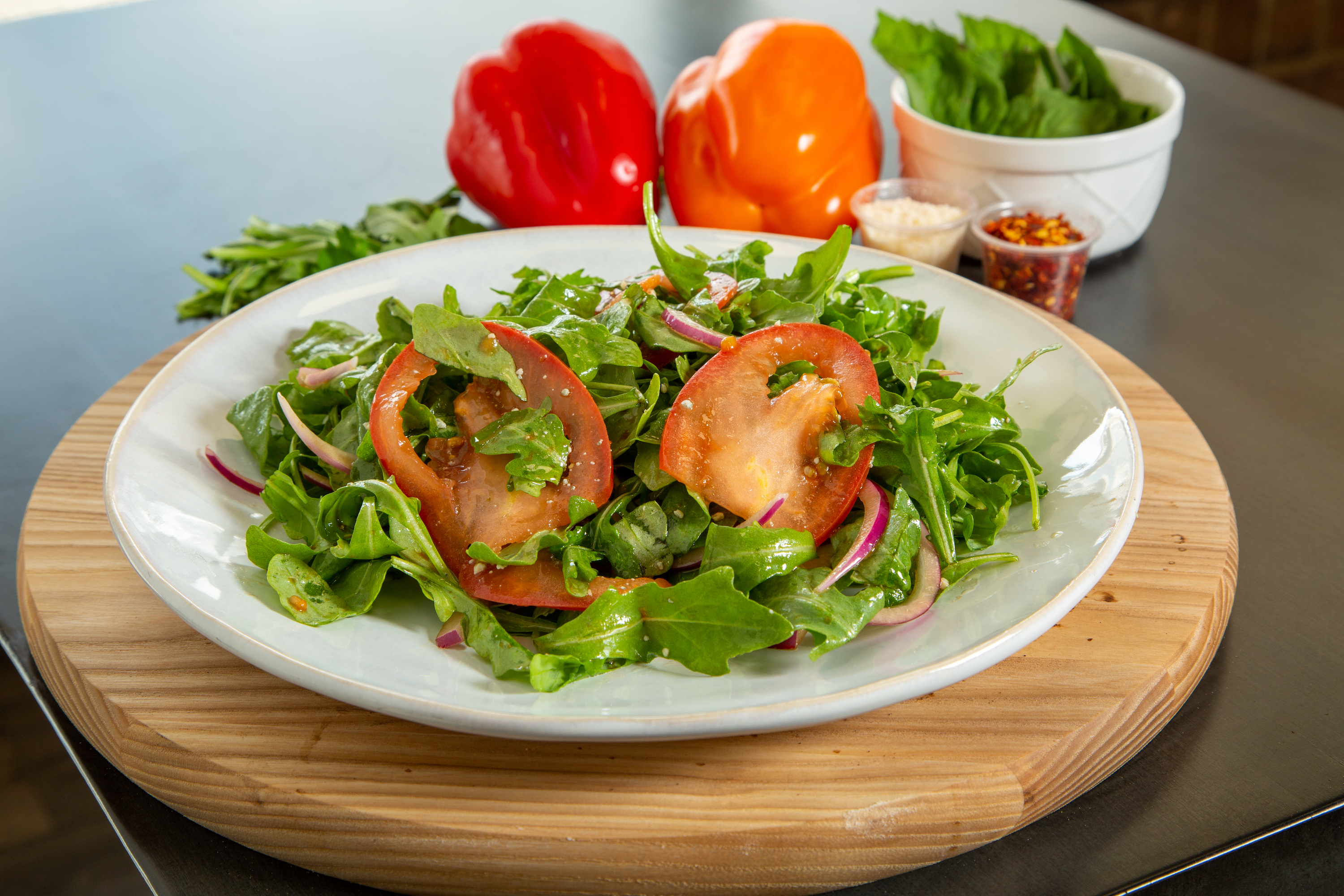 Order Arugula Salad food online from Pizza Exclusive store, Naperville on bringmethat.com