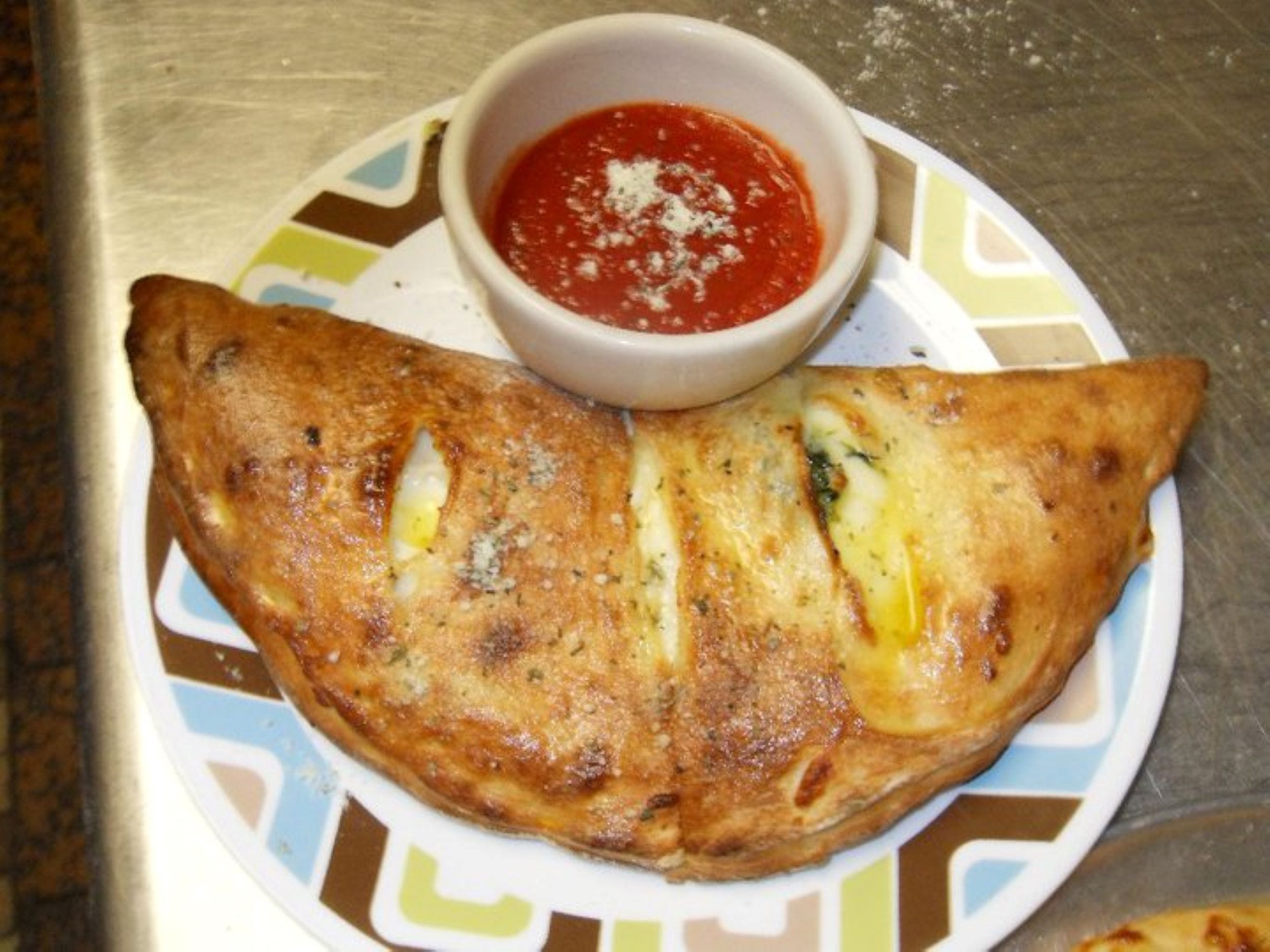 Order Cheese Calzone - Small food online from Alfredo's store, Bristol on bringmethat.com