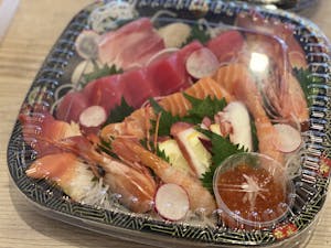 Order D6. Sashimi Platter (21pc) food online from Bengee Sushi store, Ontario on bringmethat.com