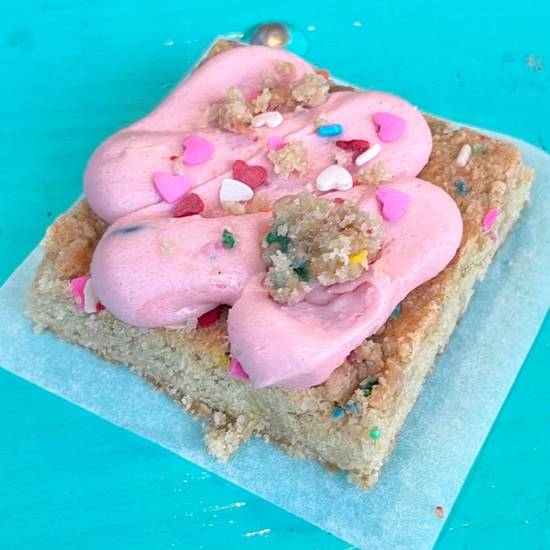 Order Frosted Pink Cookie Square food online from The Cookie Dough Cafe store, Portland on bringmethat.com