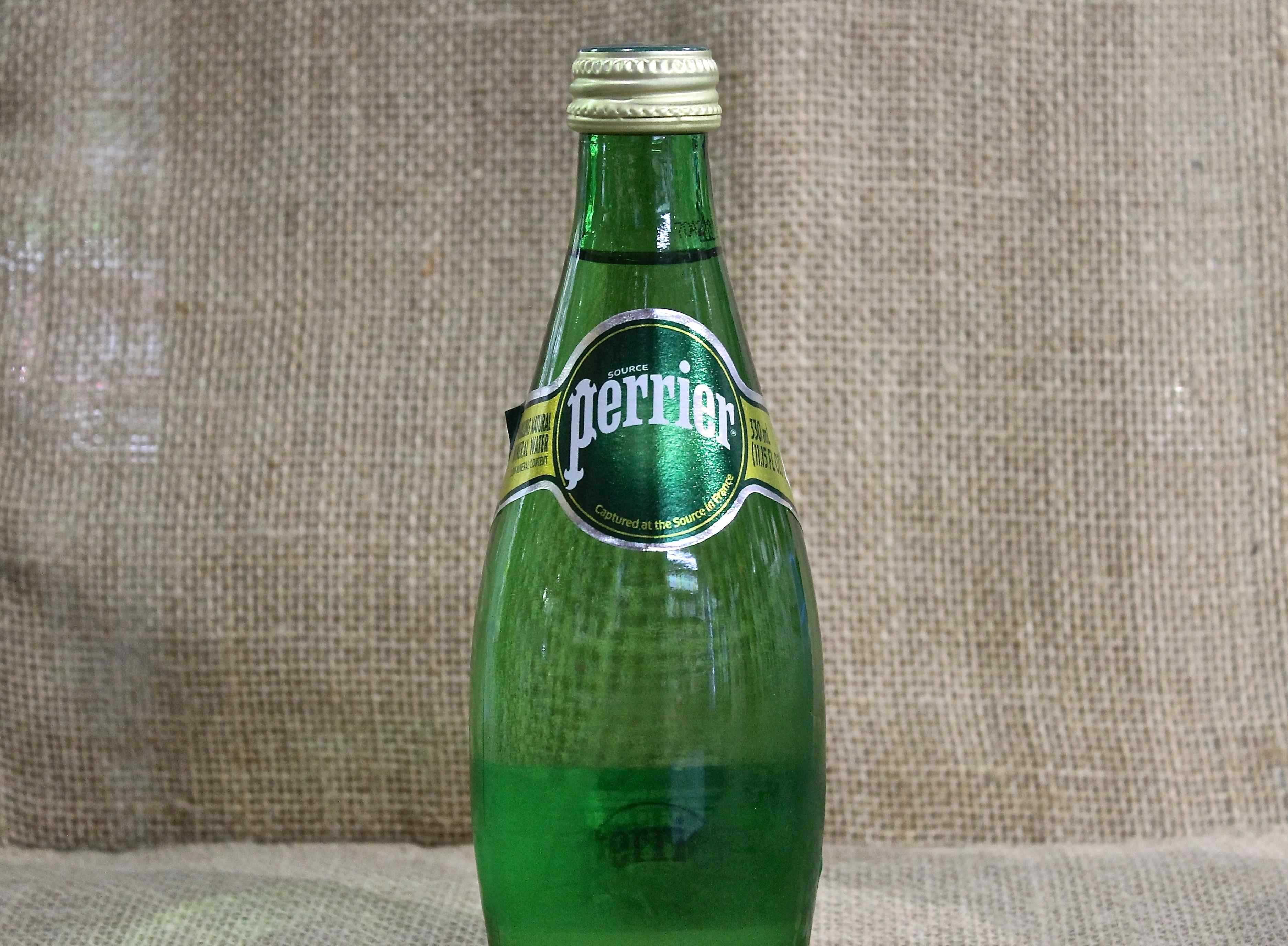 Order Perrier Sparkling Water food online from The Burger Joint store, New York on bringmethat.com
