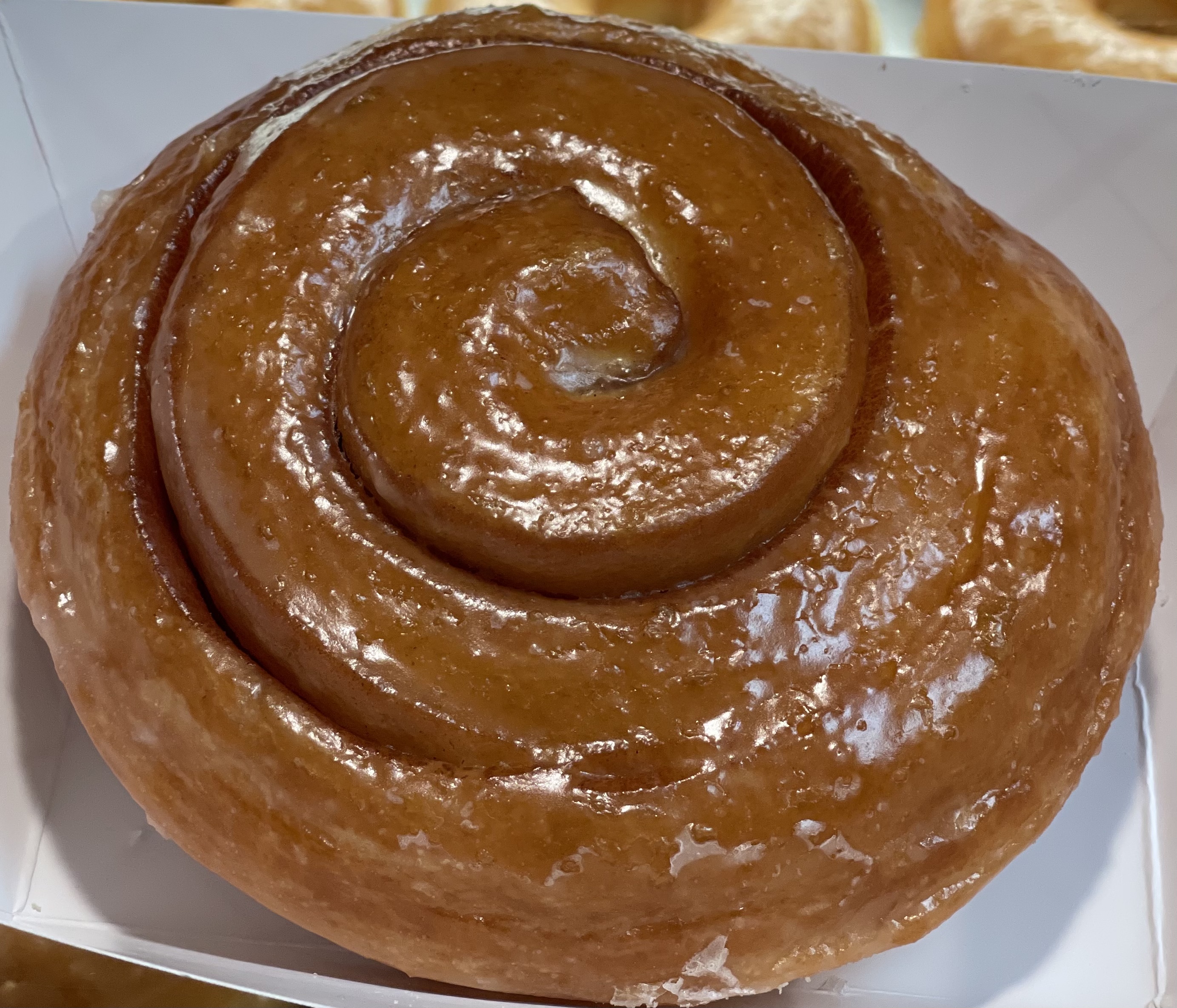 Order Cinnamon Roll Donut  food online from Glaze Donuts store, Ceres on bringmethat.com