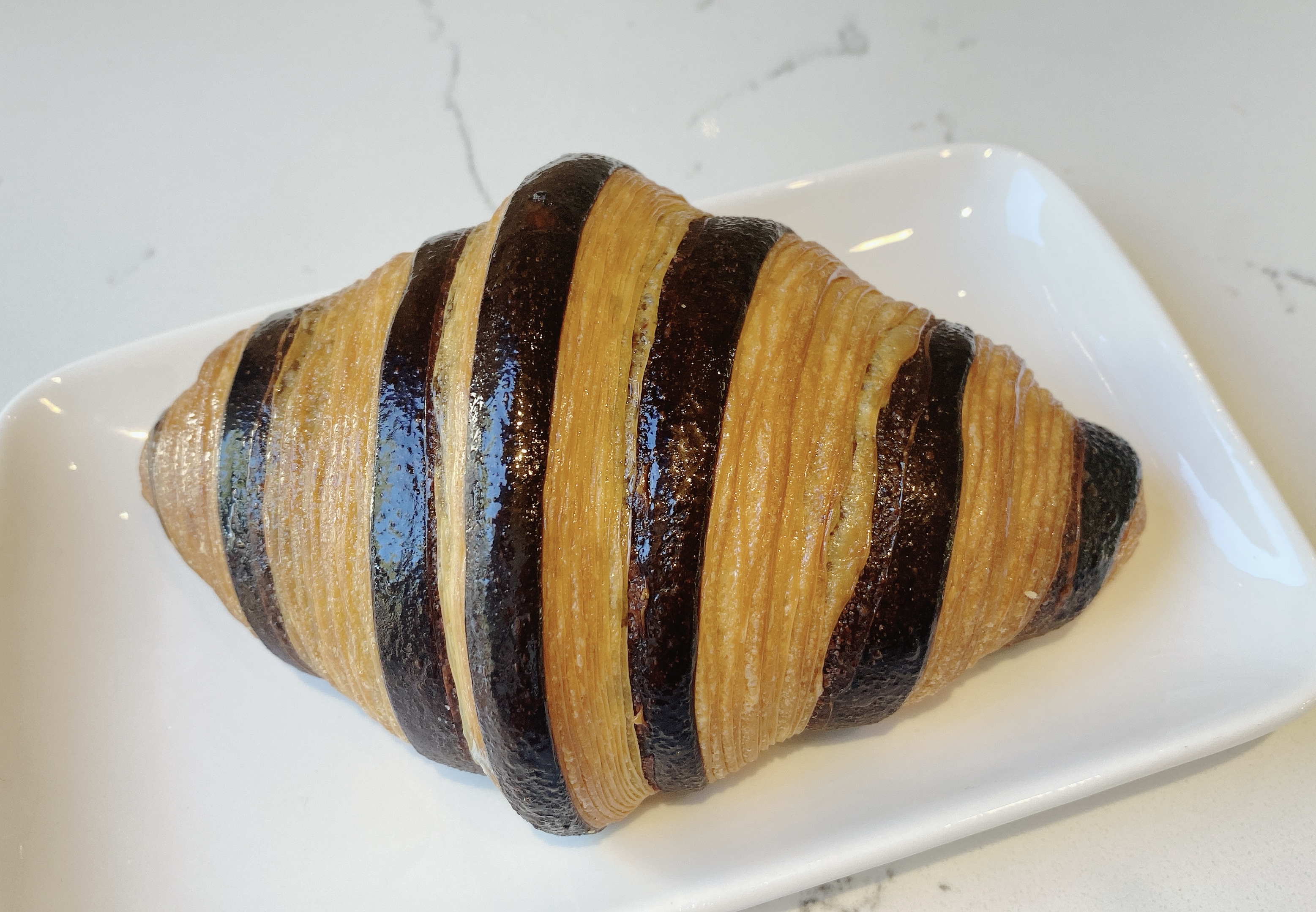 Order Black Sesame Croissant food online from Alexander Patisserie store, Mountain View on bringmethat.com