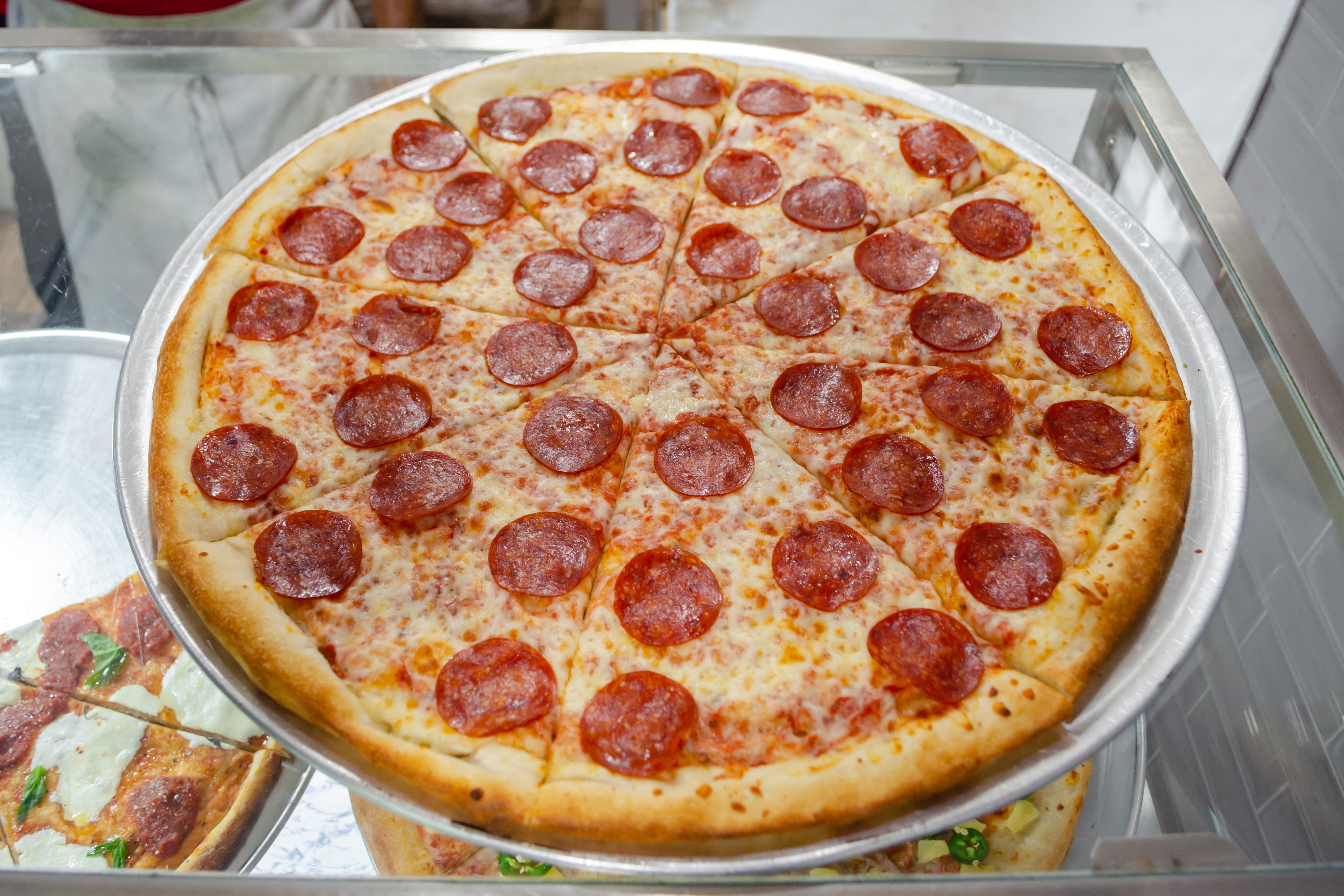 Order Pepperoni Lover Pizza - 18'' food online from 99¢ Pizza & Hot Dog store, New York on bringmethat.com