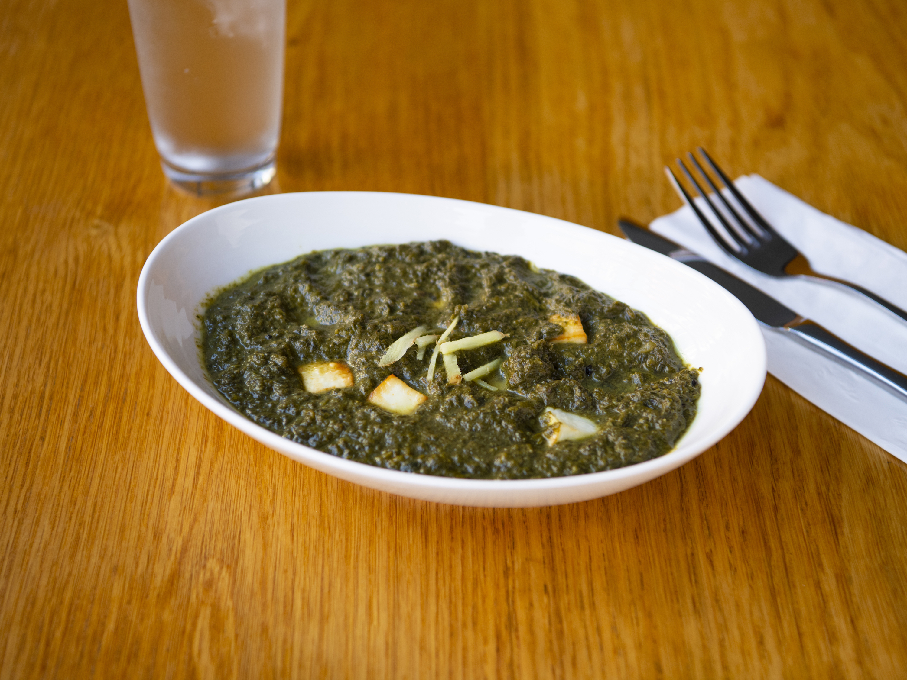 Order Saag Curry food online from Yarsa Nepalese Cuisine store, San Francisco on bringmethat.com