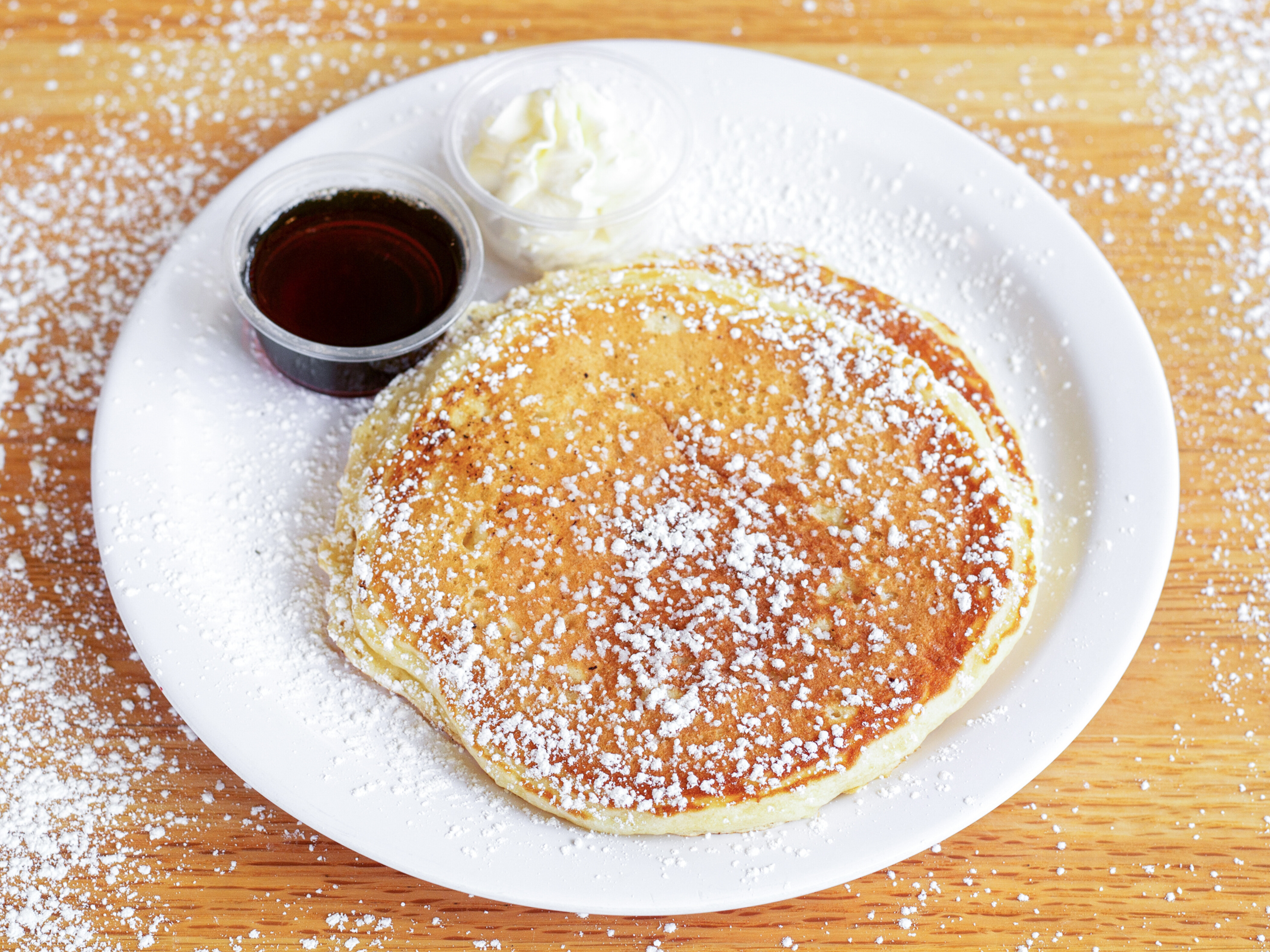 Order Two Buttermilk Pancakes food online from Courageous Bakery & Cafe store, Oak Park on bringmethat.com