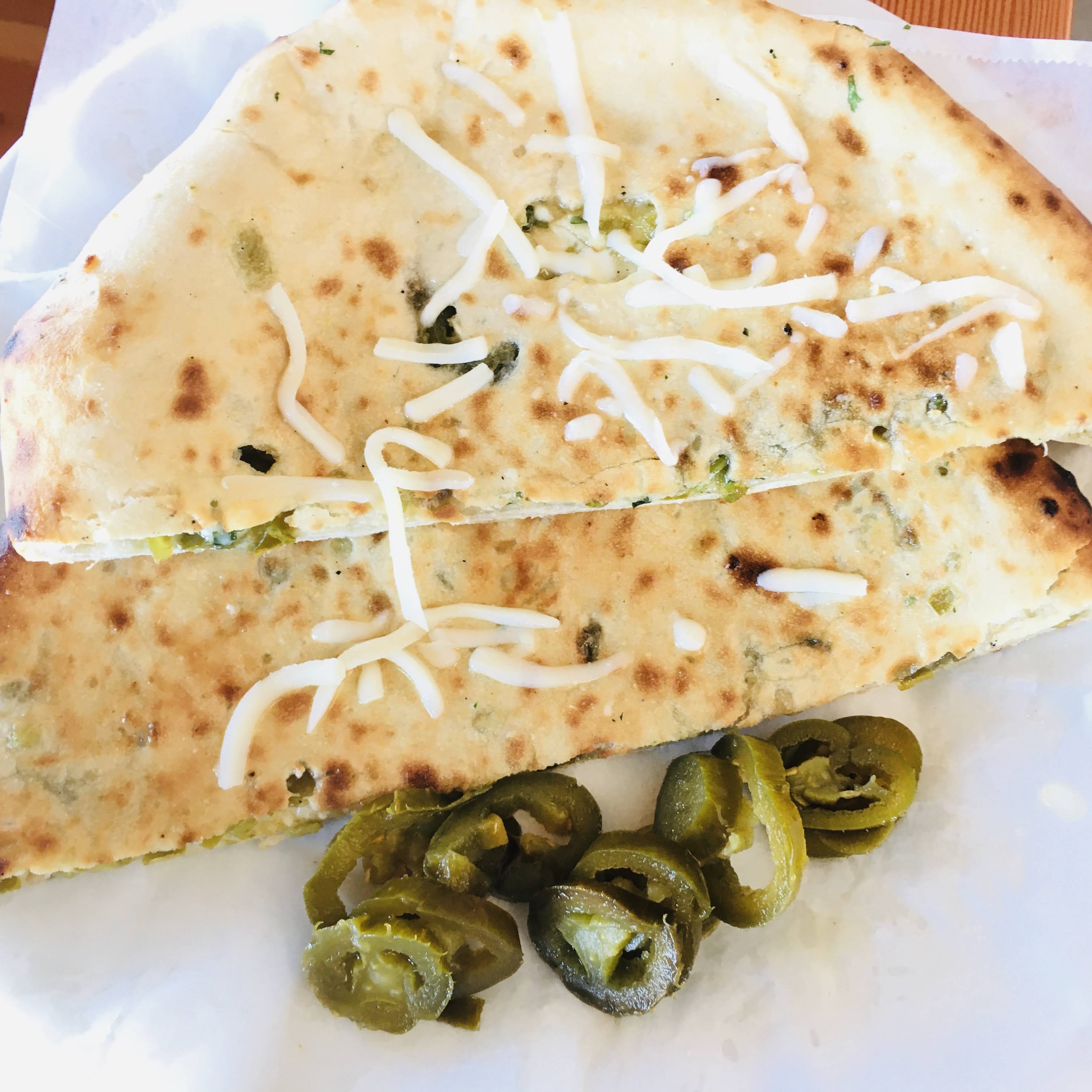 Order Jalapeno Cheese Naan food online from Manchurian Indian Cuisine store, West Sacramento on bringmethat.com
