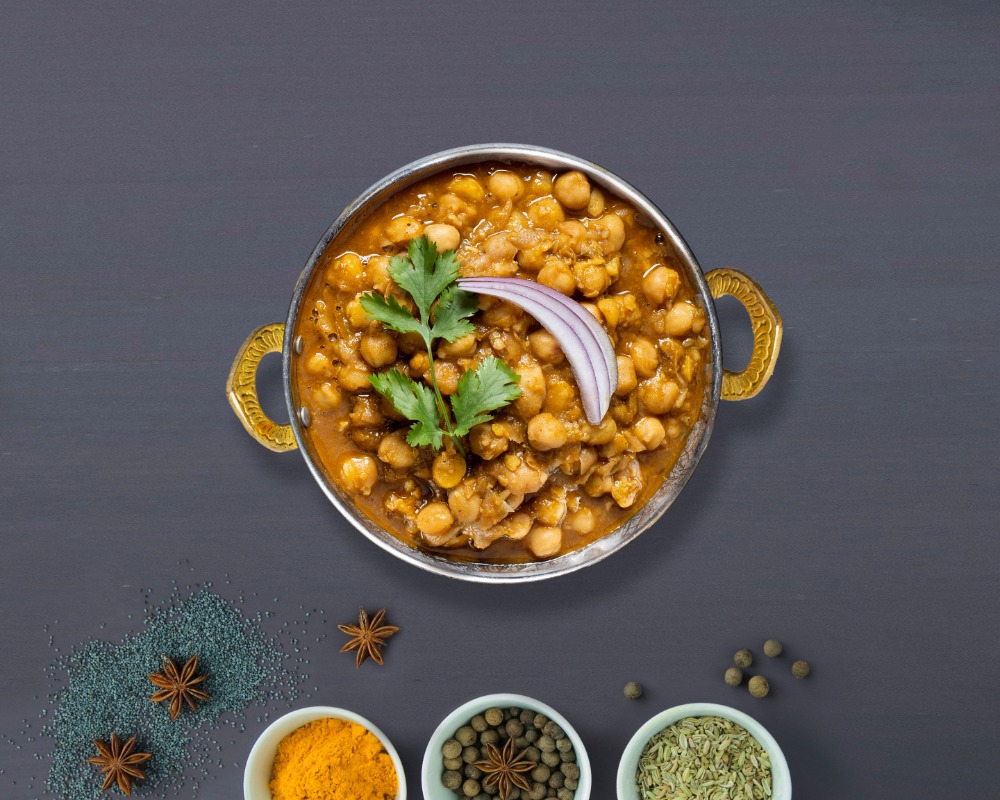 Order Chosen Chana Masala food online from Master Of Naan store, Tempe on bringmethat.com